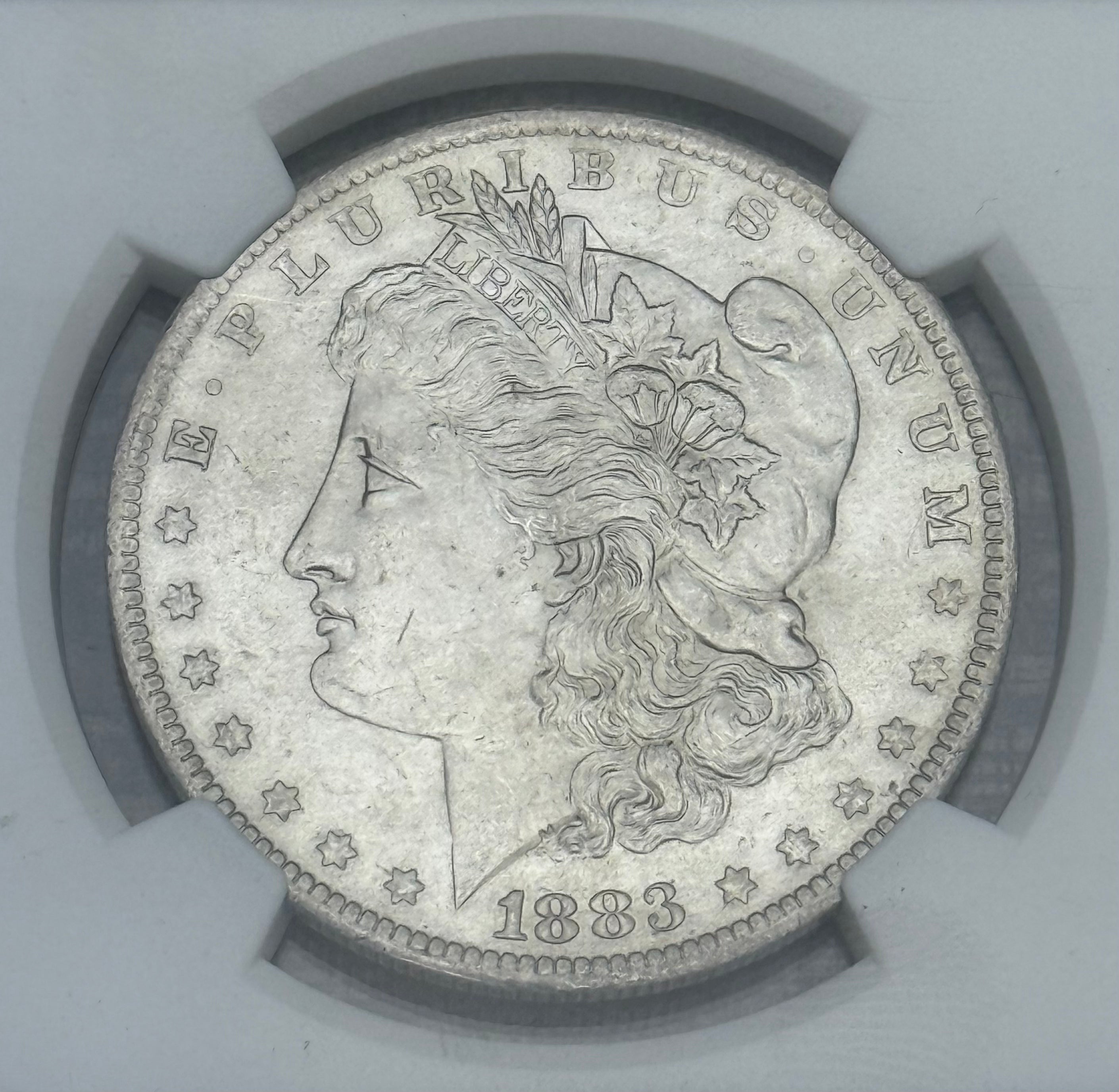 1883-O $1 US Morgan Silver Dollar NGC MS64