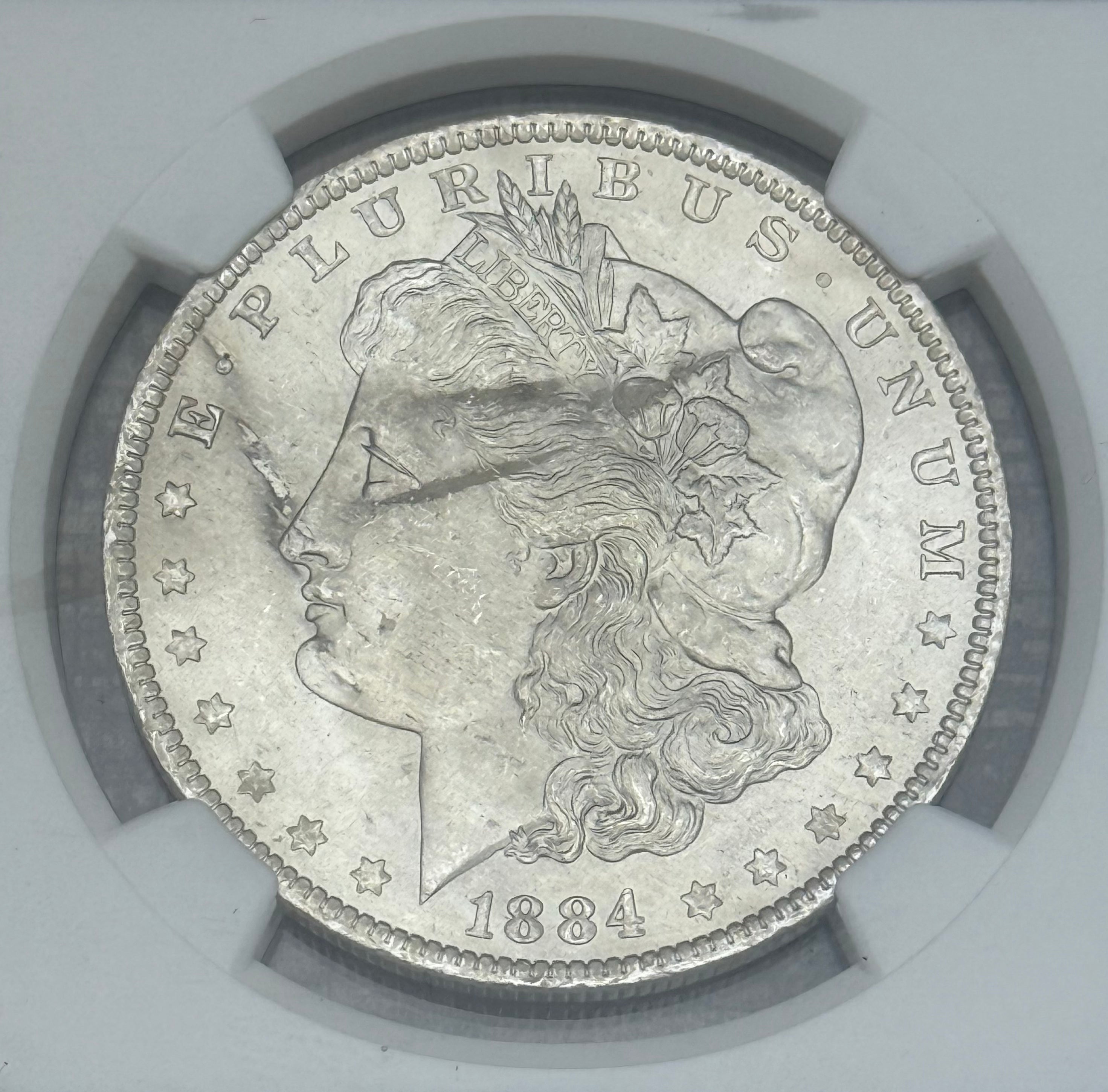 1884-O $1 US Morgan Silver Dollar NGC MS63