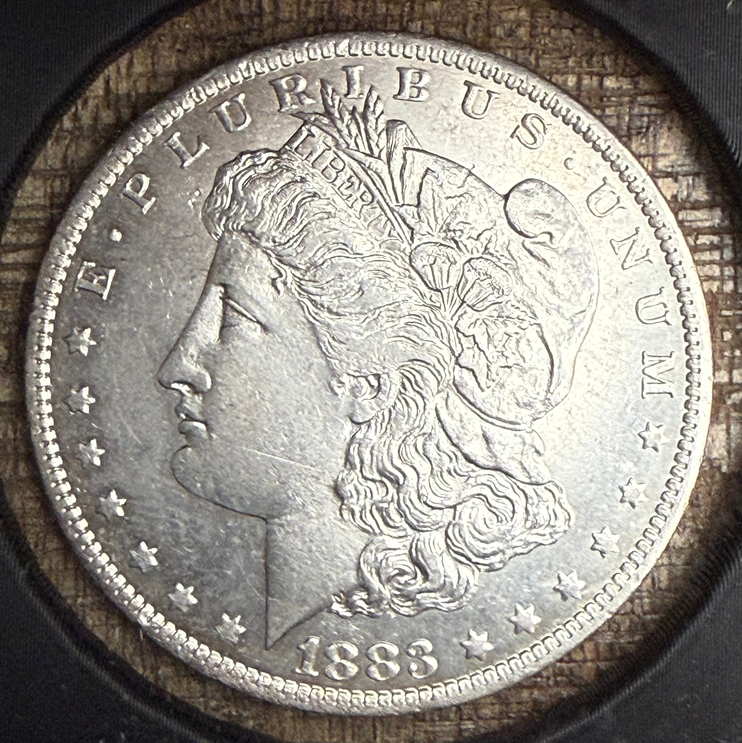 1883-O $1 US Morgan Silver Dollar
