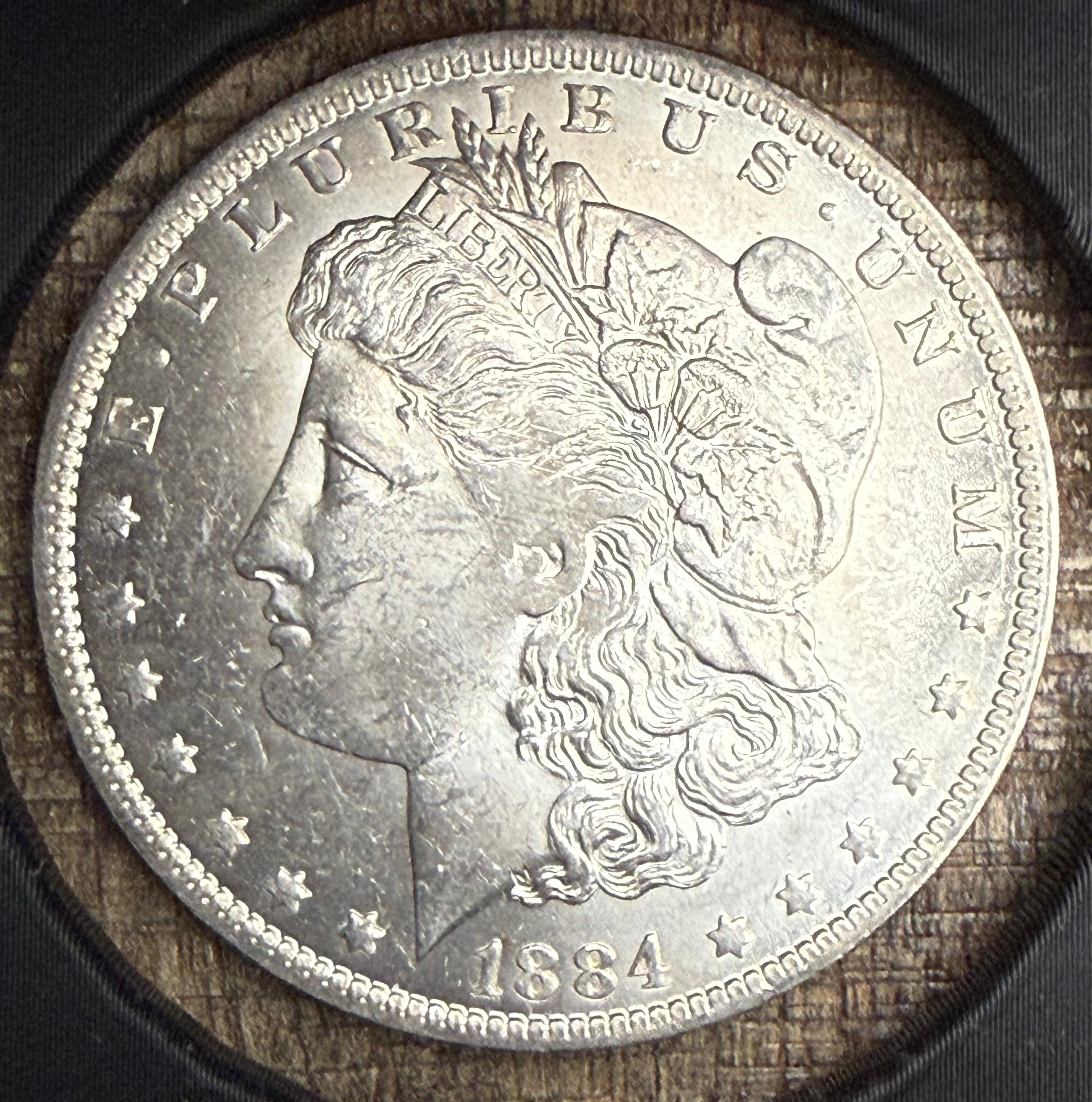 1884-O $1 US Morgan Silver Dollar