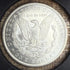 1884-O $1 US Morgan Silver Dollar