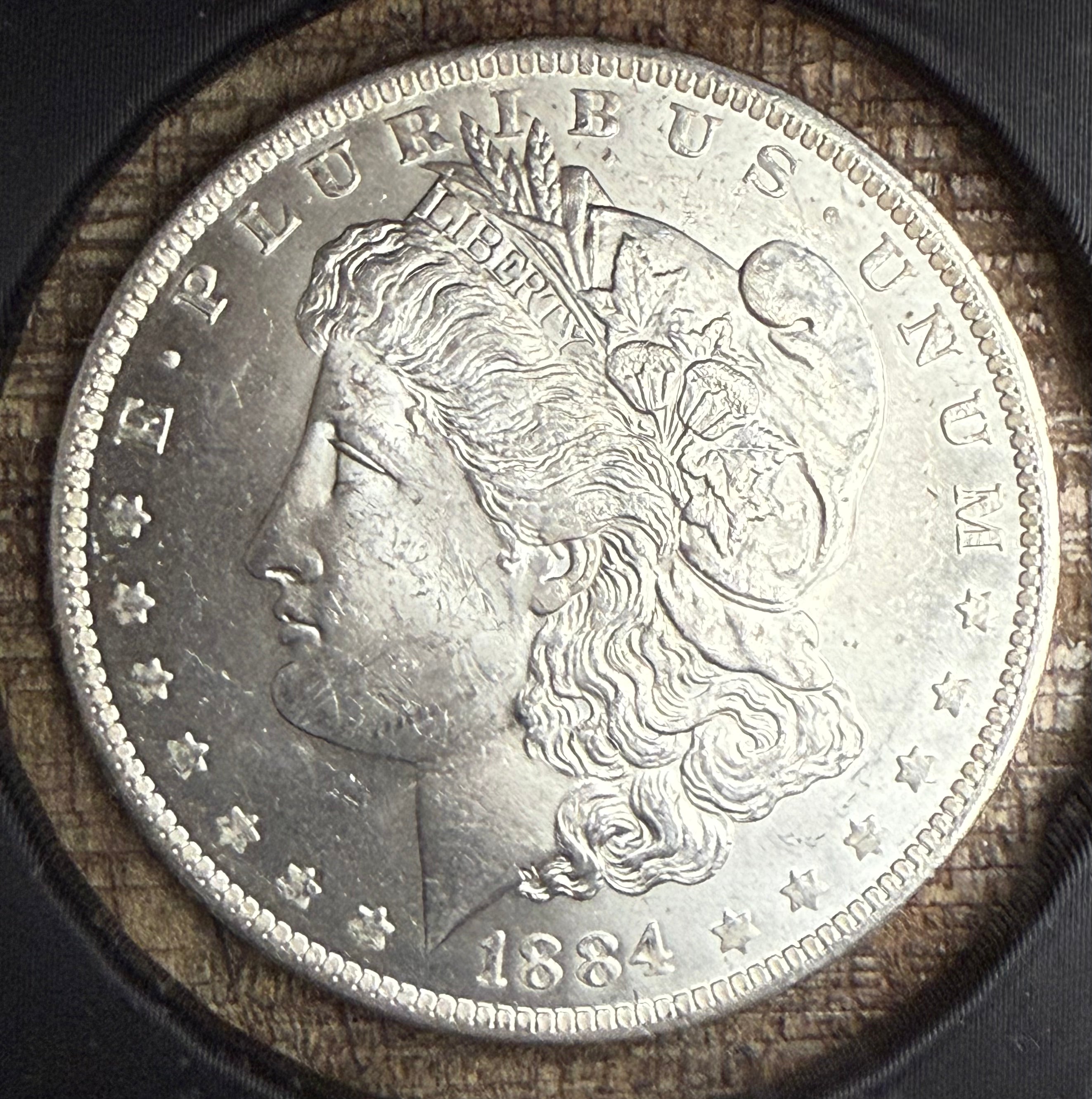 1884-O $1 US Morgan Silver Dollar