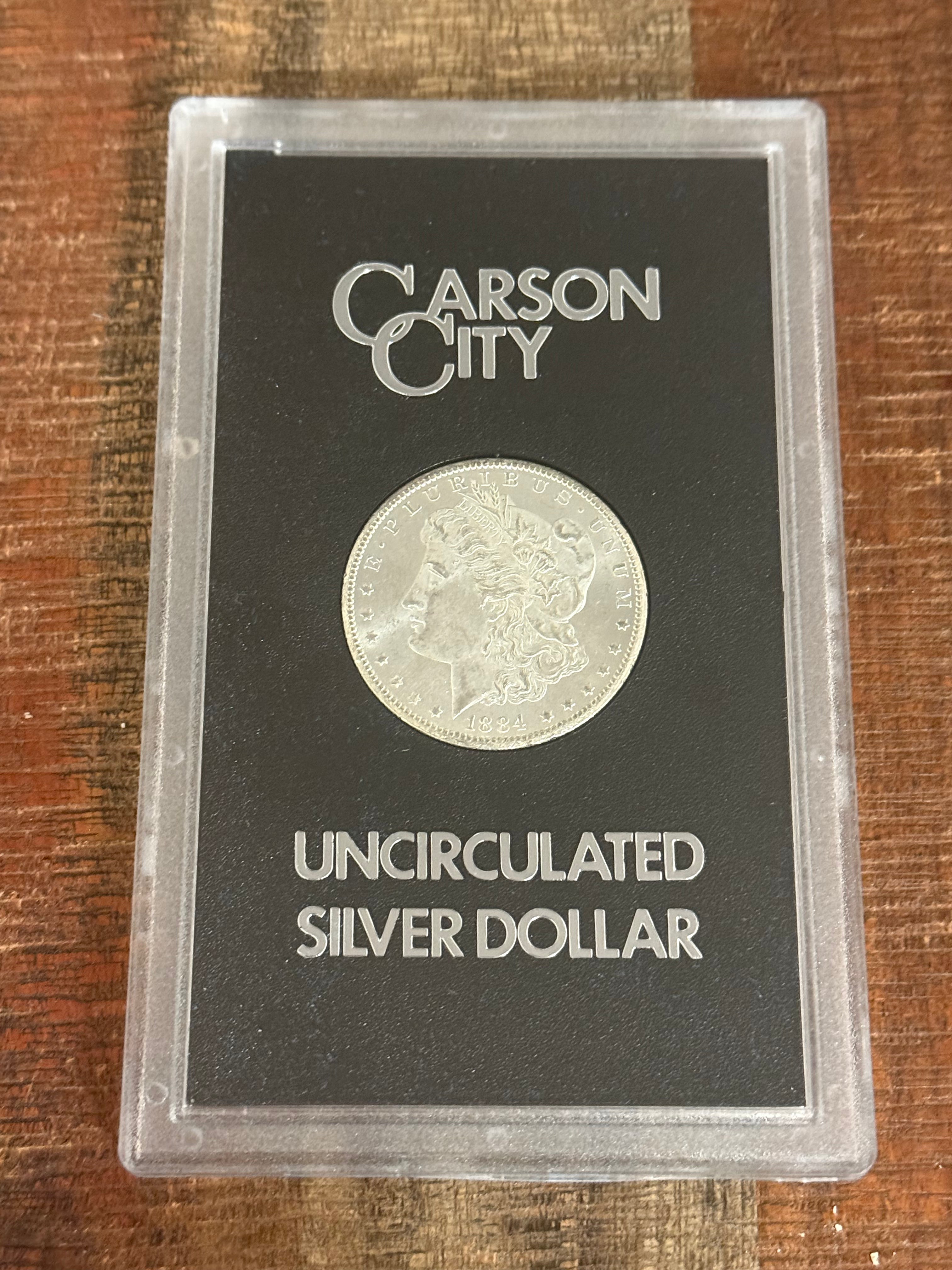 1884-CC $1 US Morgan Silver Dollar GSA Carson City ~ VAM 6