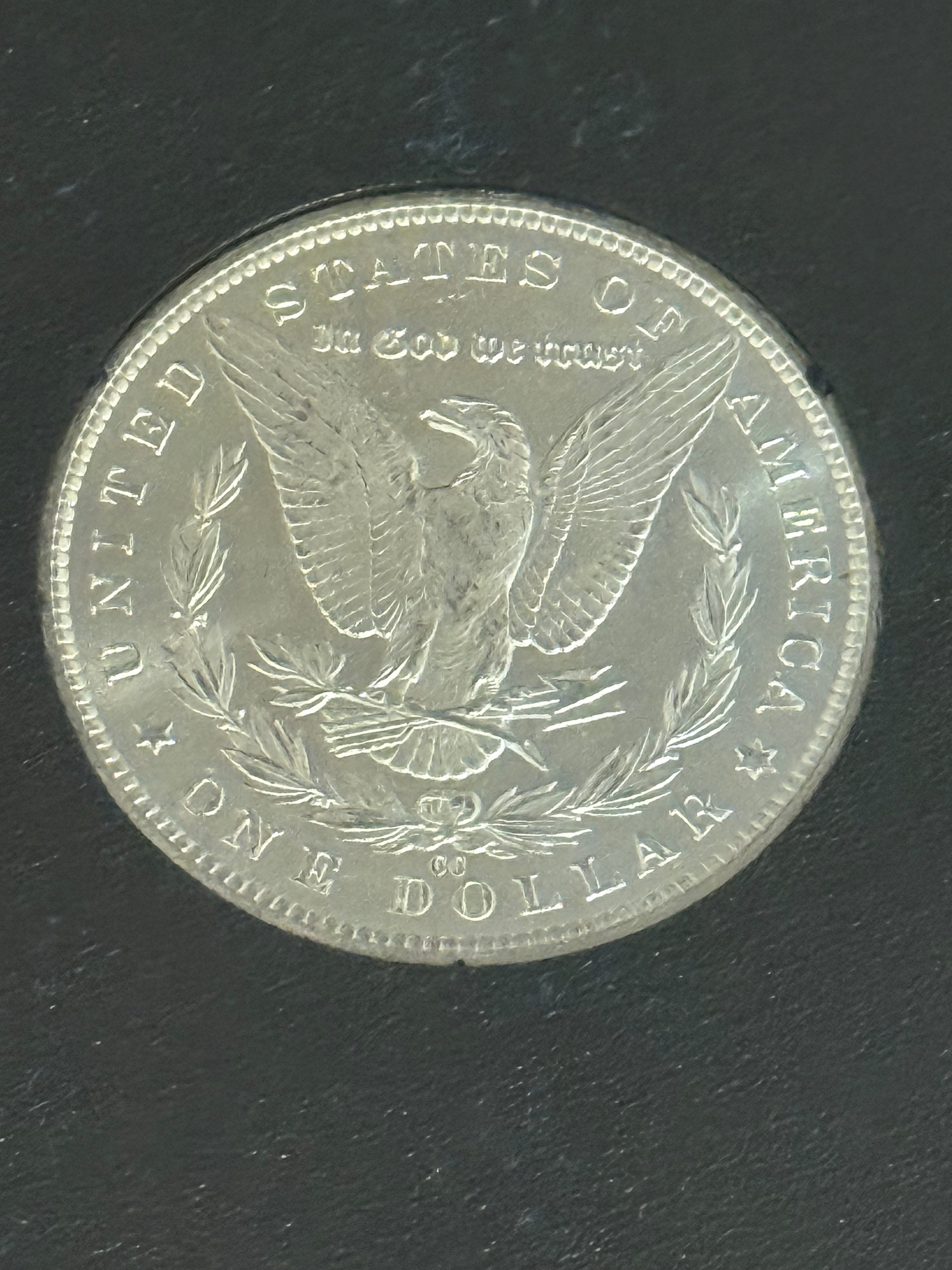 1883-CC $1 US Morgan Silver Dollar GSA Carson City ~ VAM 4