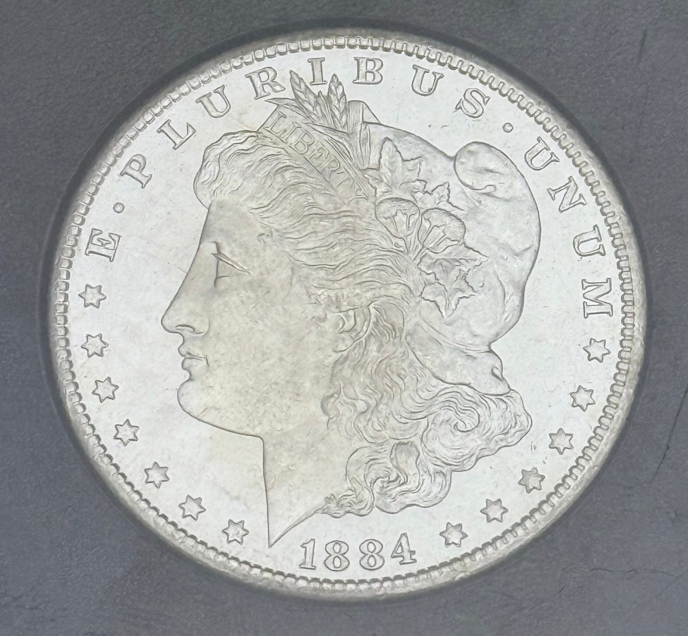 1884-CC $1 US Morgan Silver Dollar GSA Carson City ~ NGC MS64