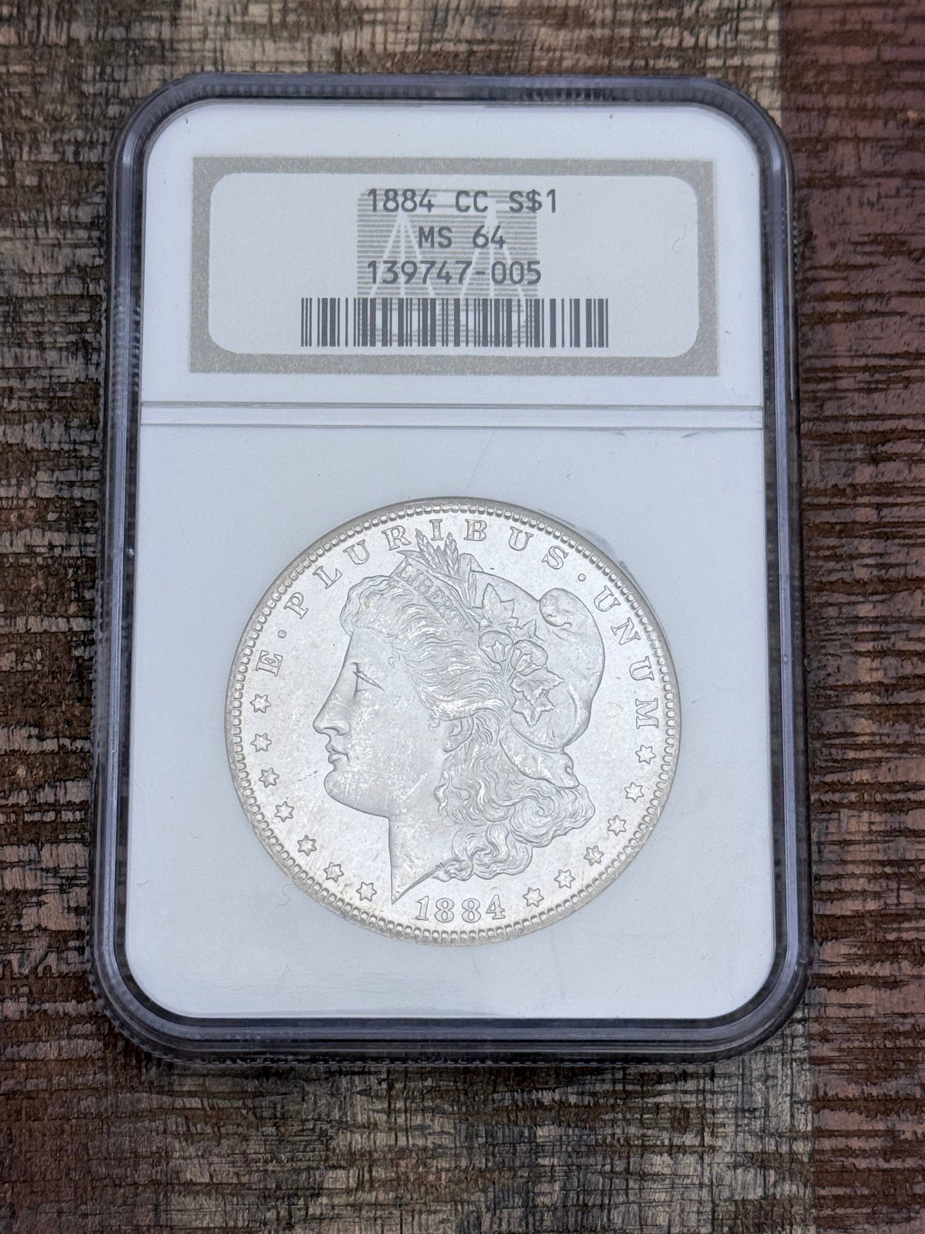 1884-CC $1 US Morgan Silver Dollar ~ NGC MS64