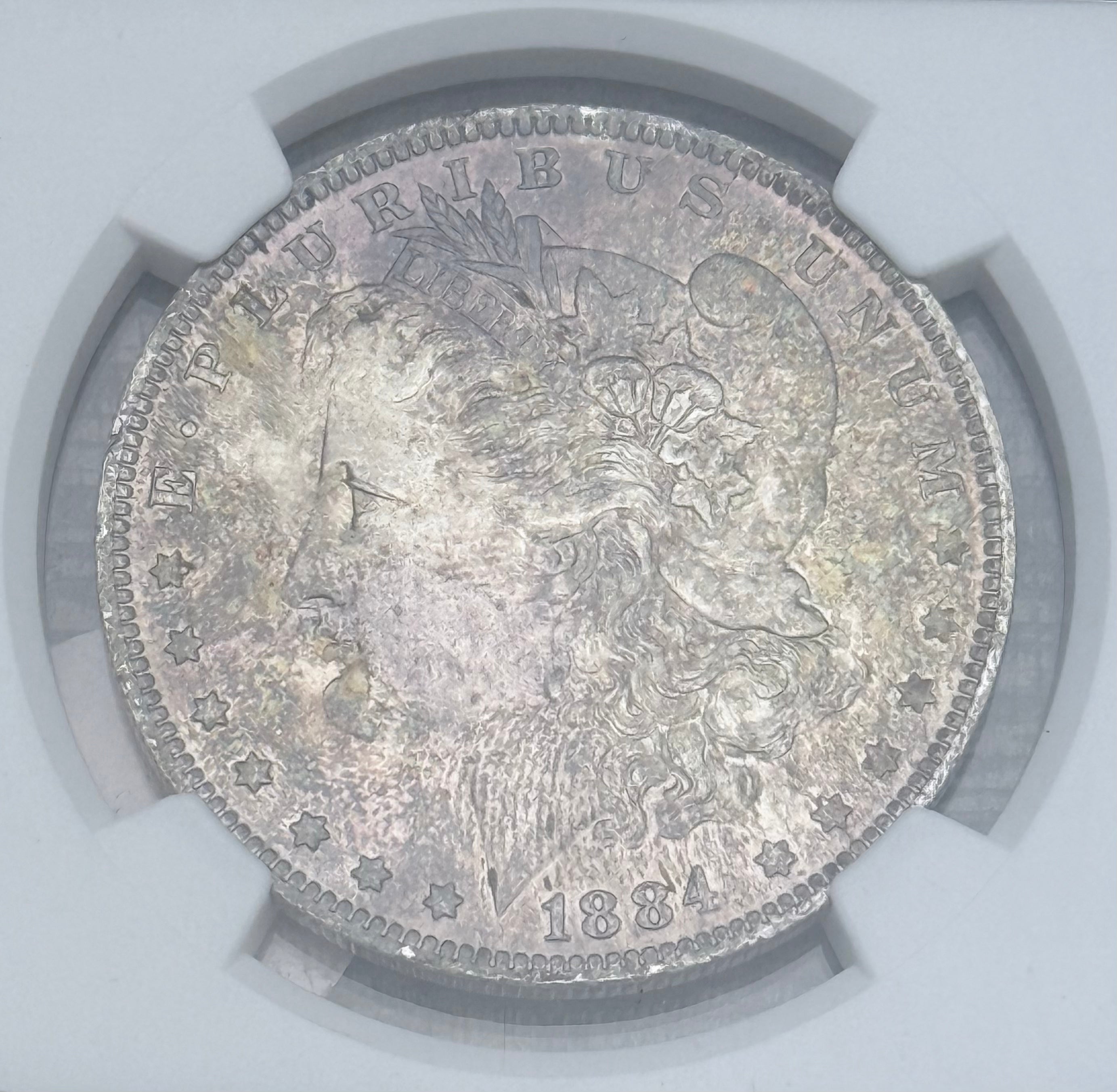 1884-O $1 US Morgan Silver Dollar ~ NGC MS64