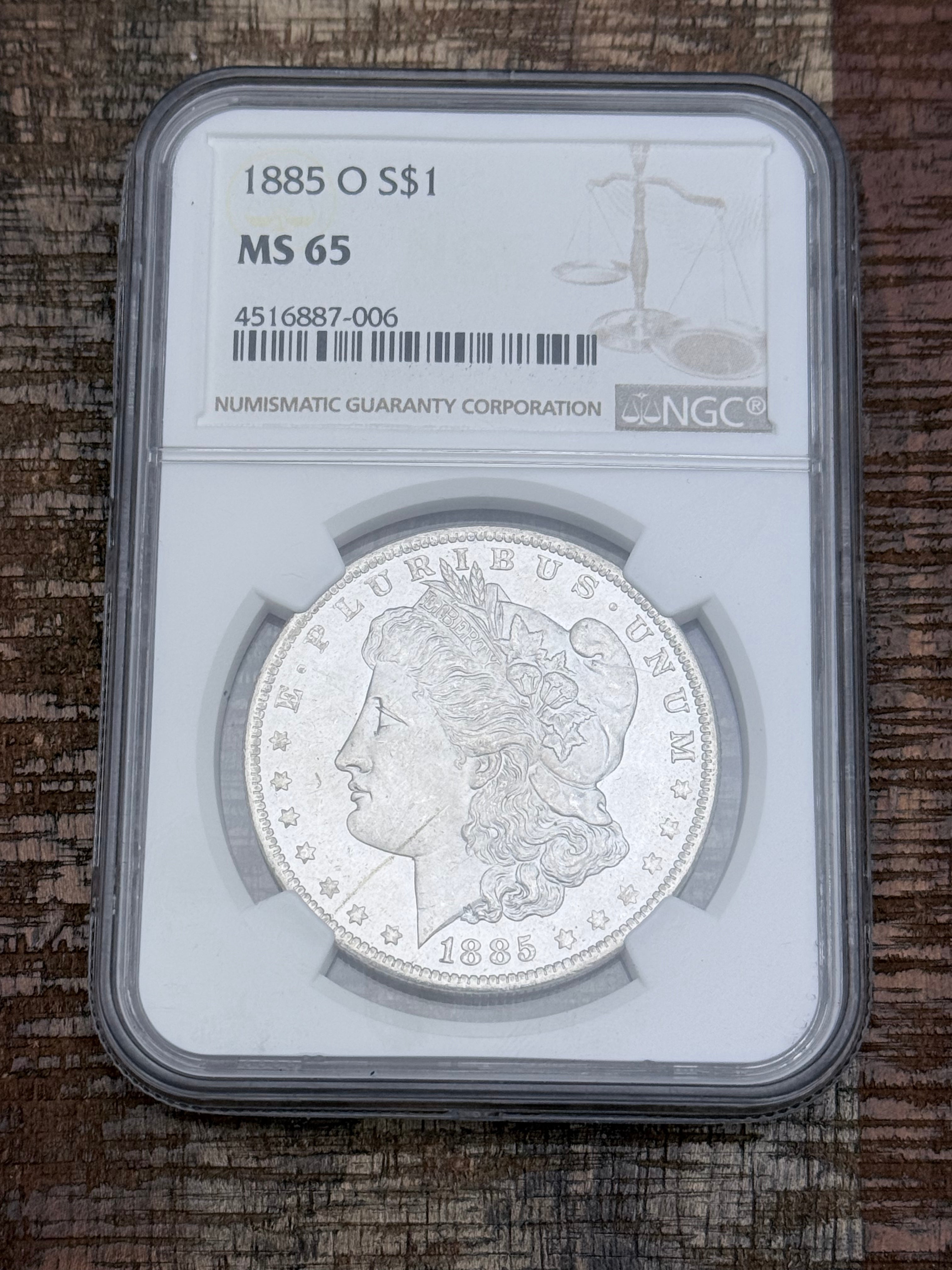 1885-O $1 US Morgan Silver Dollar ~ NGC MS65