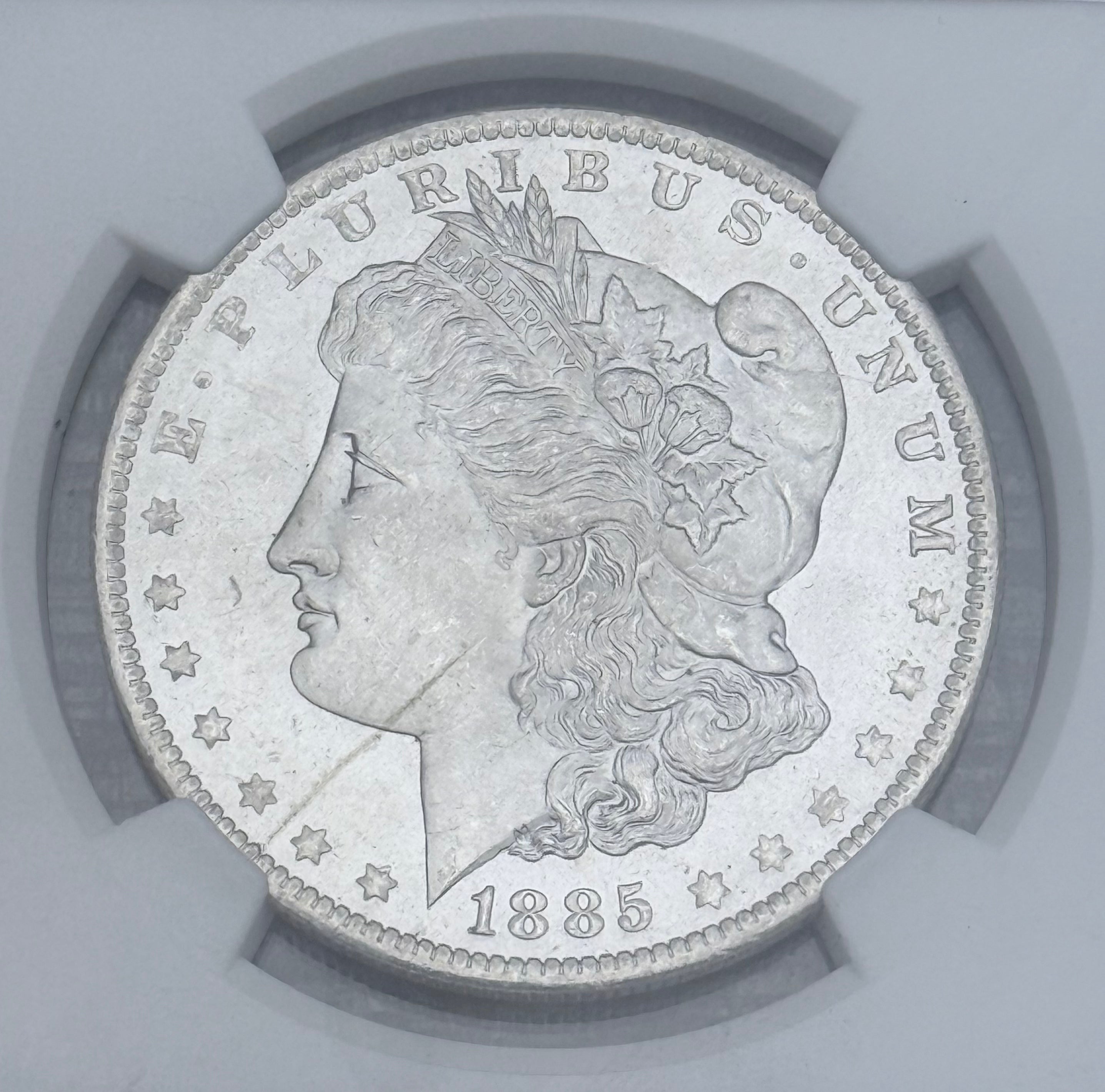 1885-O $1 US Morgan Silver Dollar ~ NGC MS65