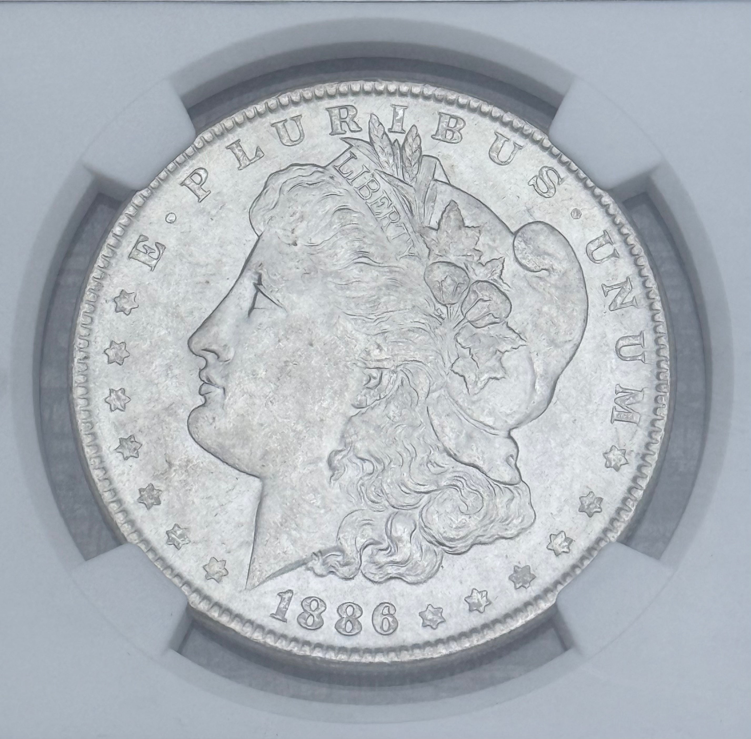 1886 $1 US Morgan Silver Dollar NGC MS64