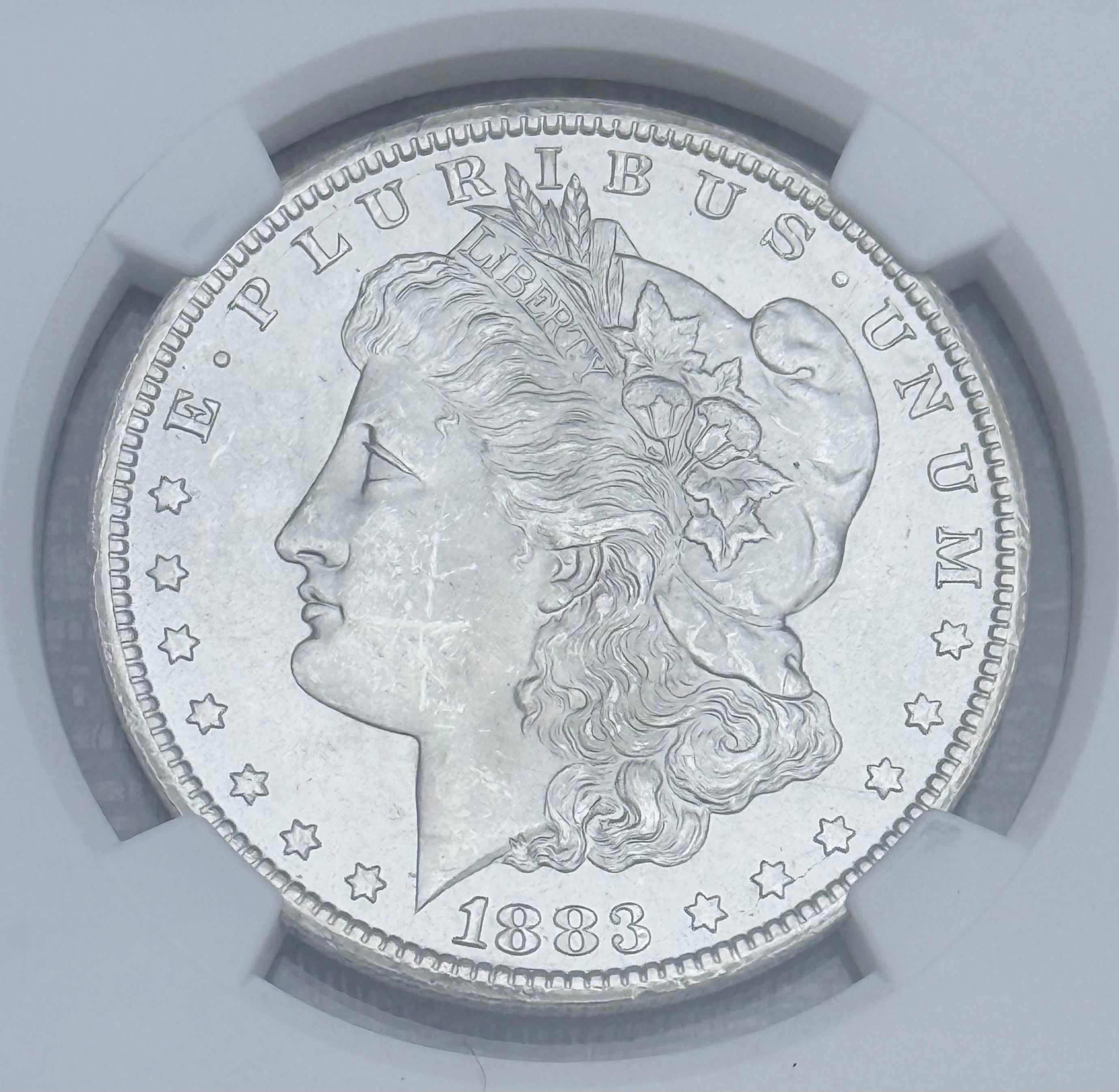 1883-CC $1 US Morgan Silver Dollar ~ NGC MS63