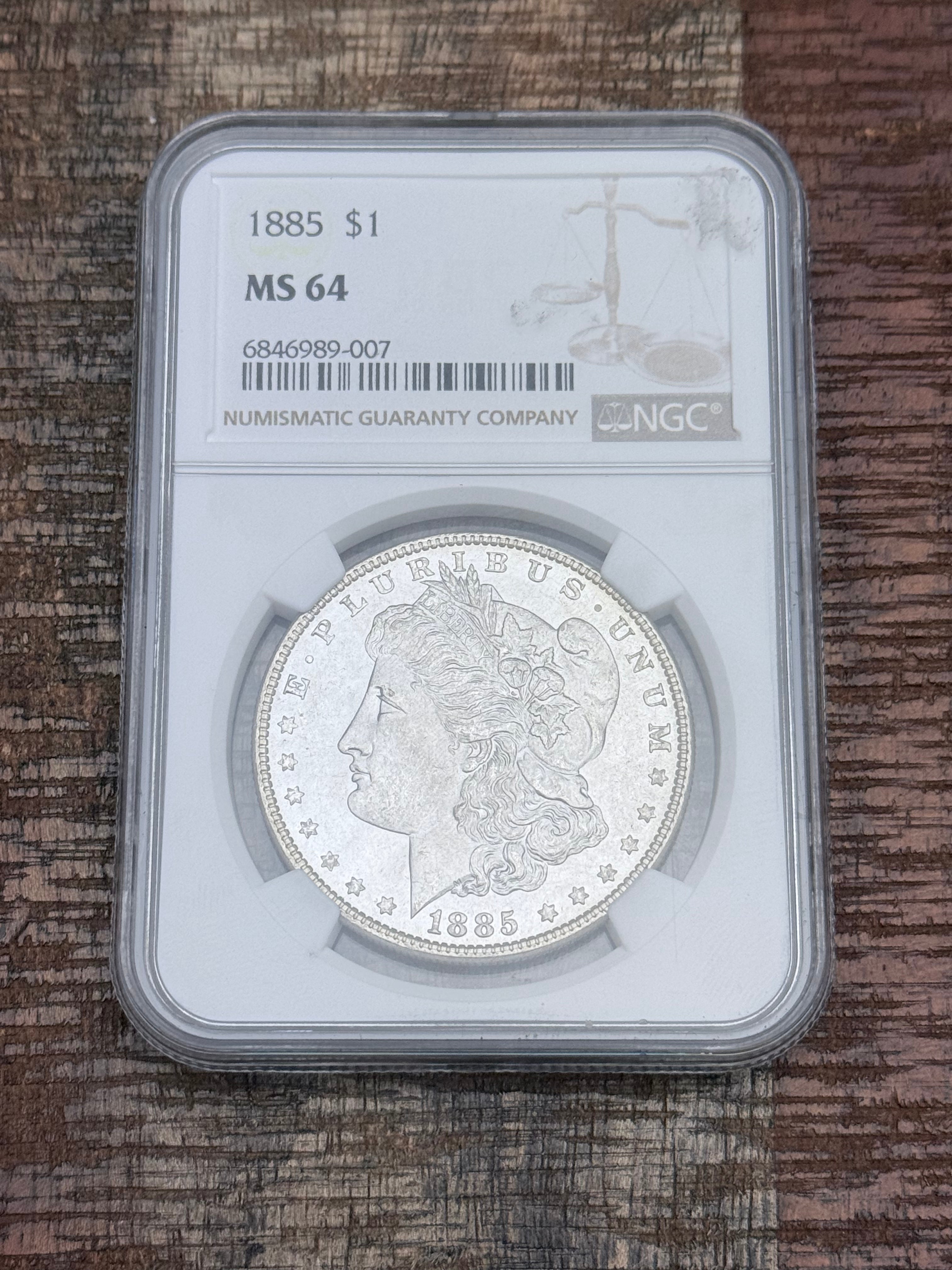 1885 $1 US Morgan Silver Dollar ~ NGC MS64
