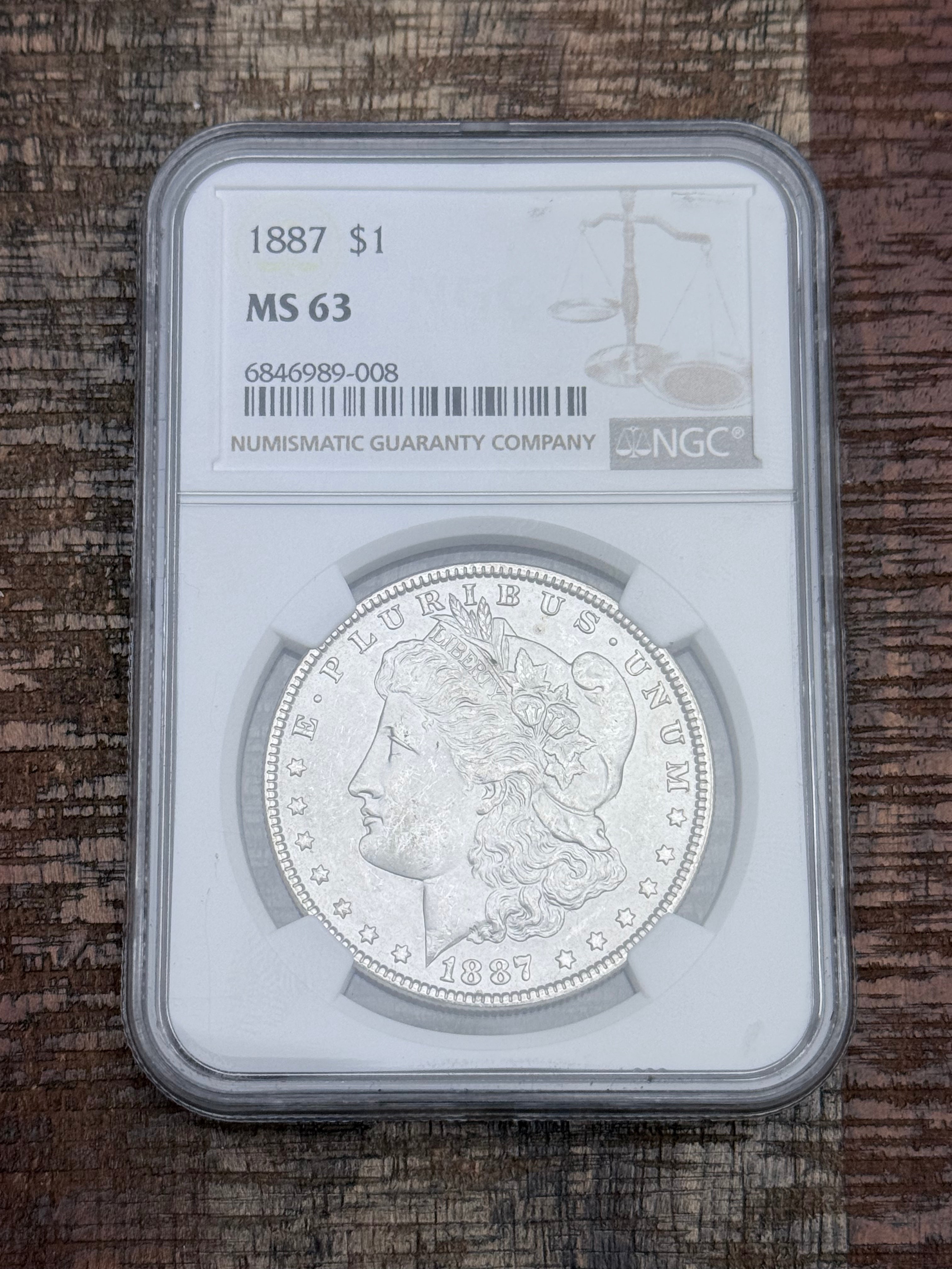 1887 $1 US Morgan Silver Dollar ~ NGC MS63