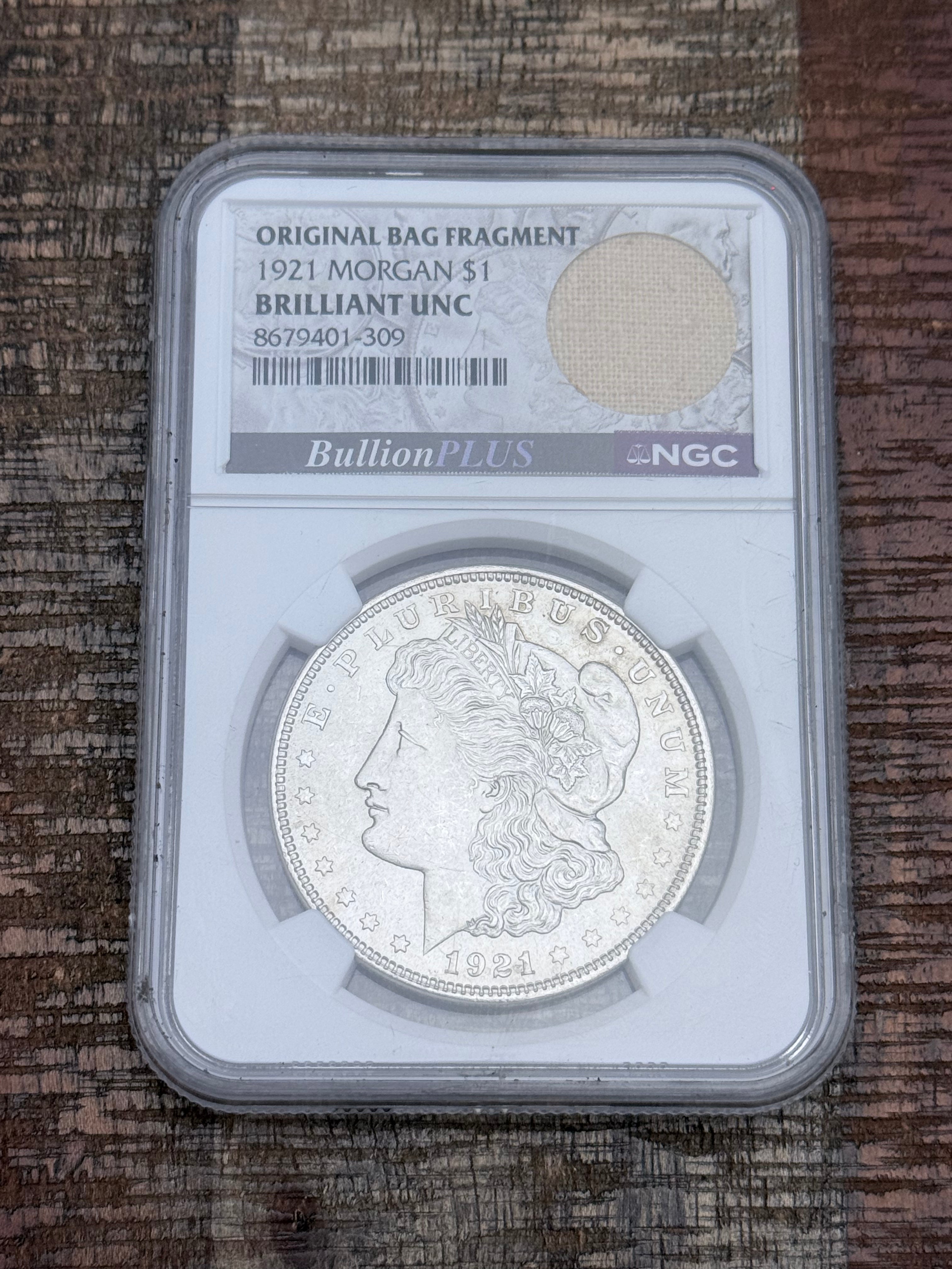 1921 $1 US Morgan Silver Dollar ~ NGC Brilliant Uncirculated ~ Original Bag Fragment*