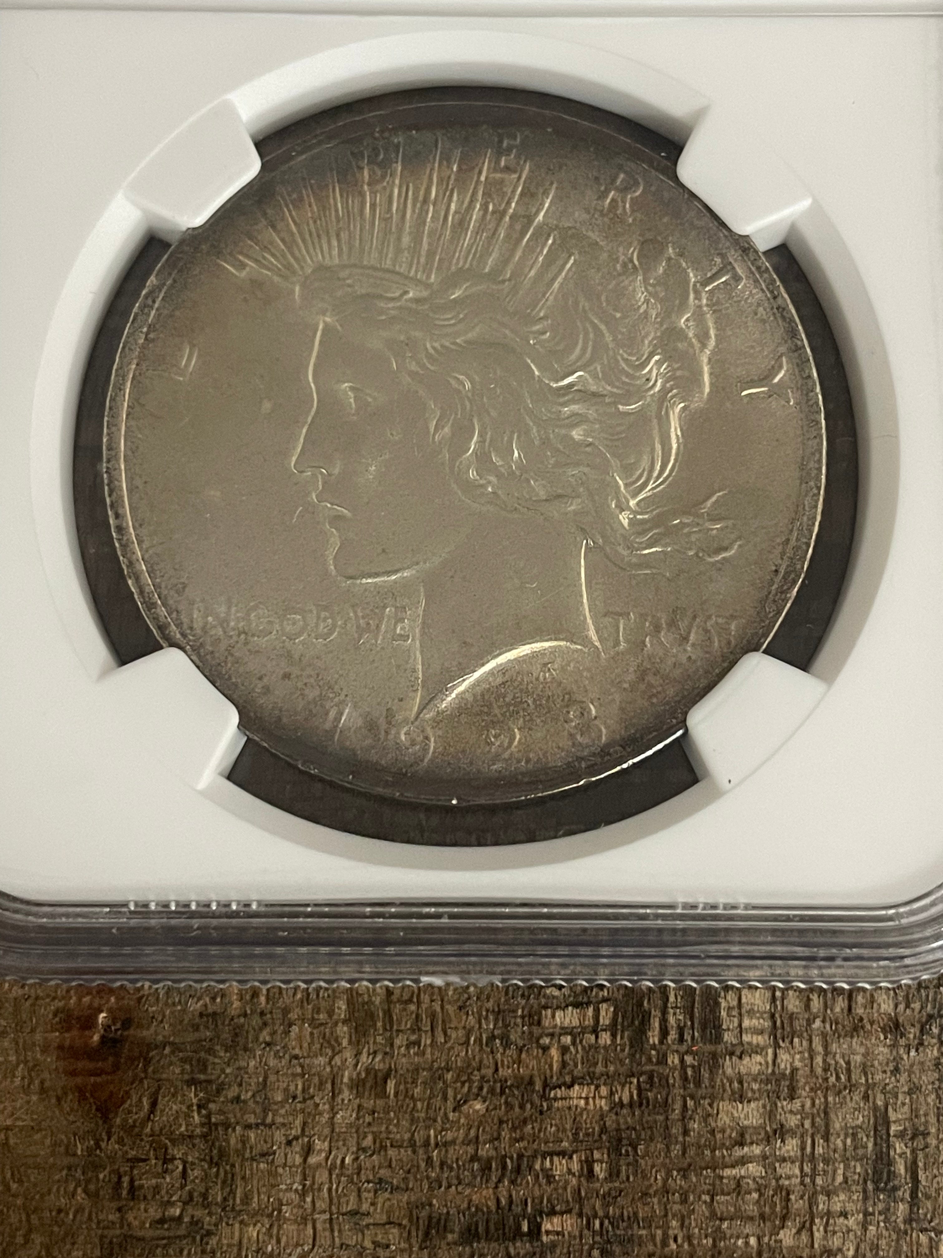 1923 $1 US Silver Peace Dollar NGC UNC Details ~ Cleaned ~ Toning
