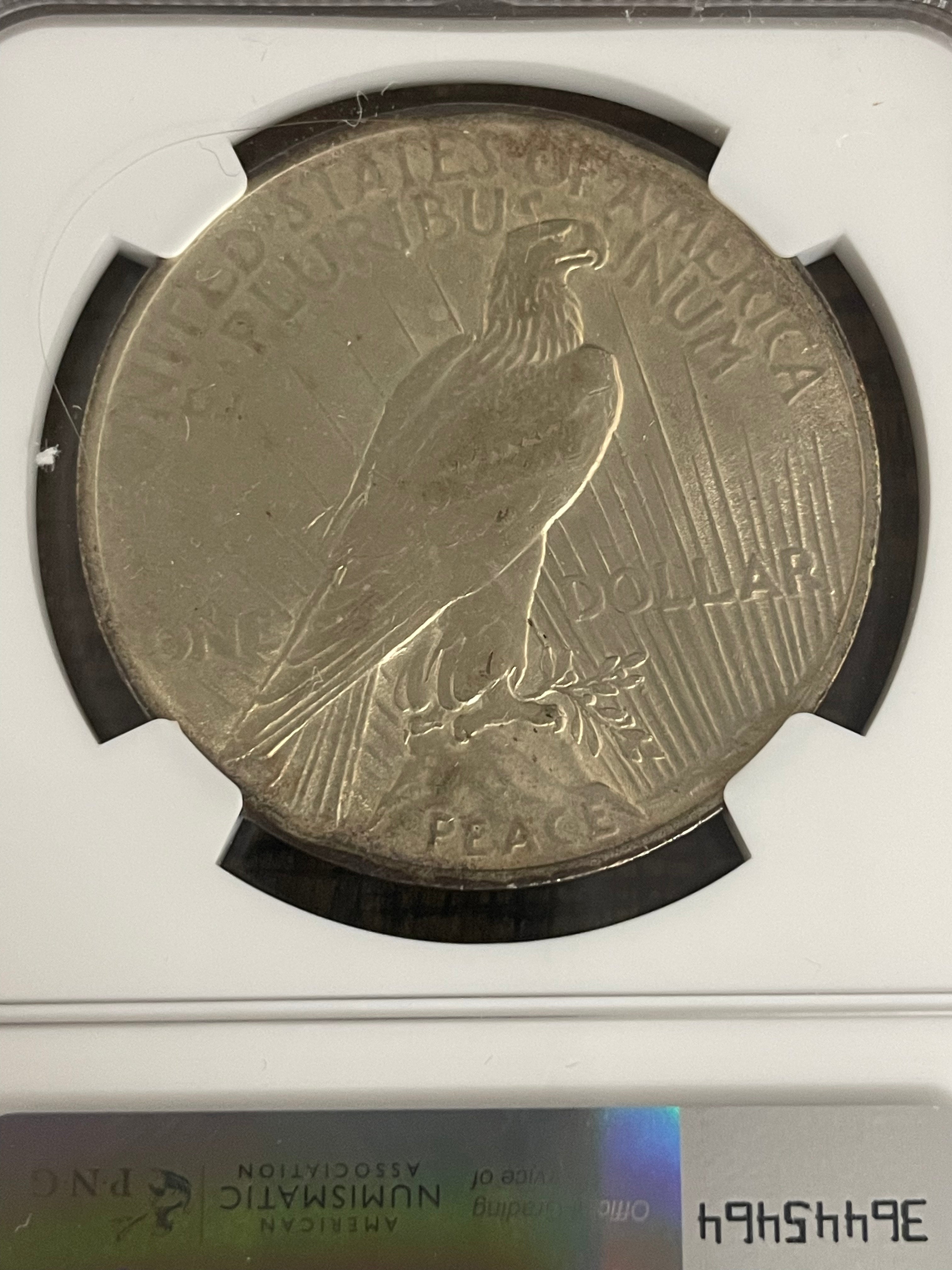 1923 $1 US Silver Peace Dollar NGC UNC Details ~ Cleaned ~ Toning