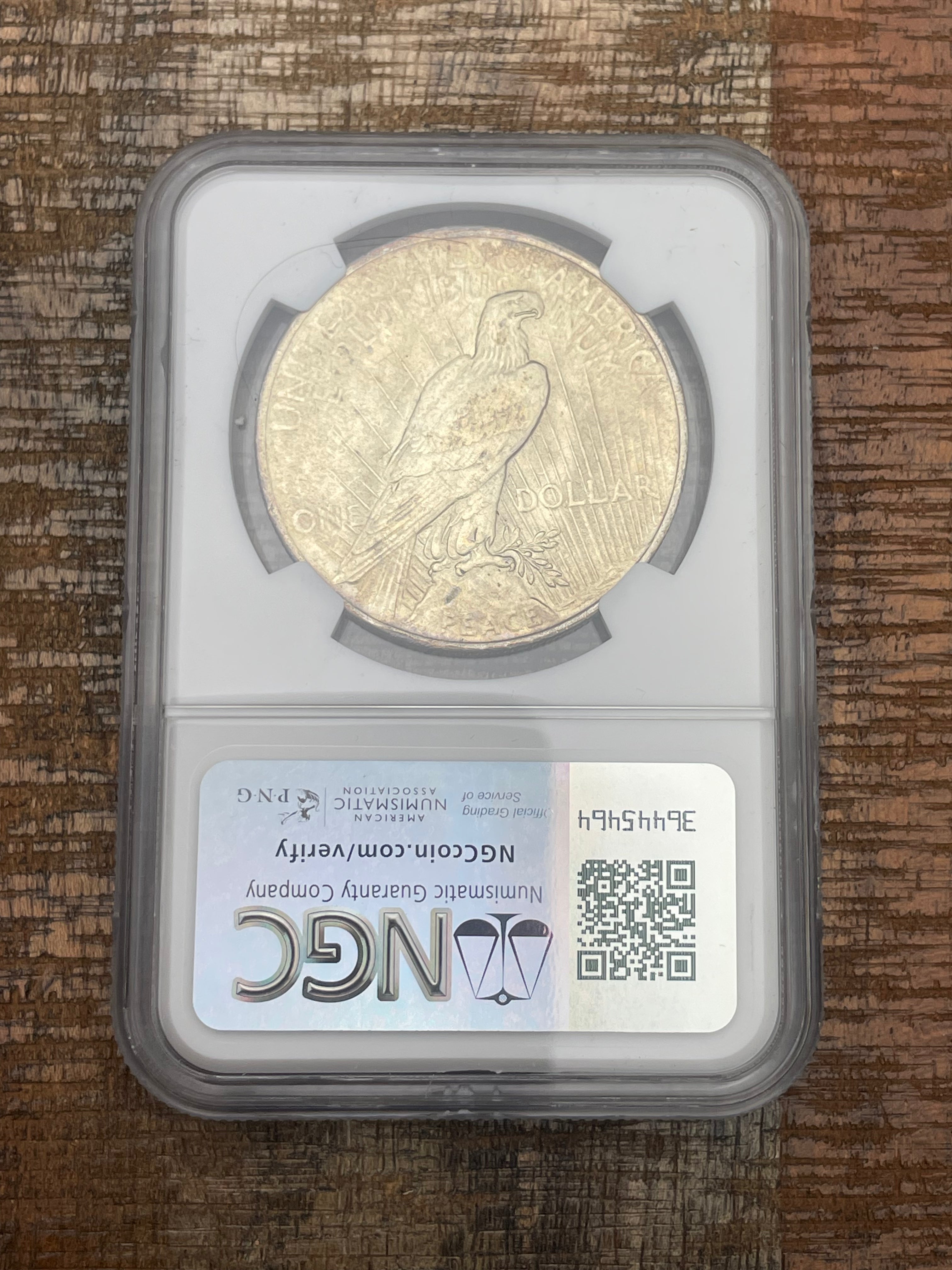 1923 $1 US Silver Peace Dollar NGC UNC Details ~ Cleaned ~ Toning