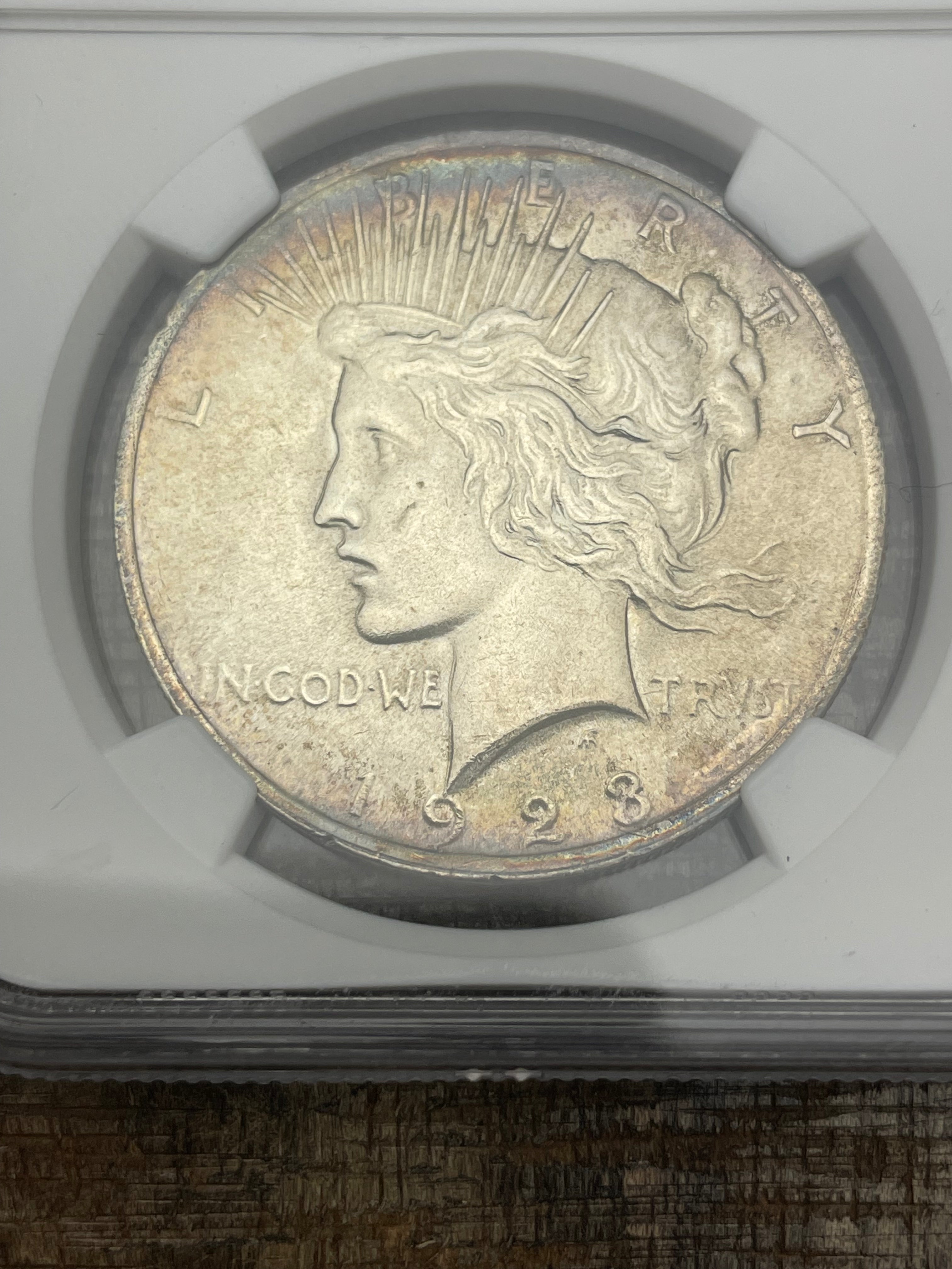 1923 $1 US Silver Peace Dollar NGC UNC Details ~ Cleaned ~ Toning