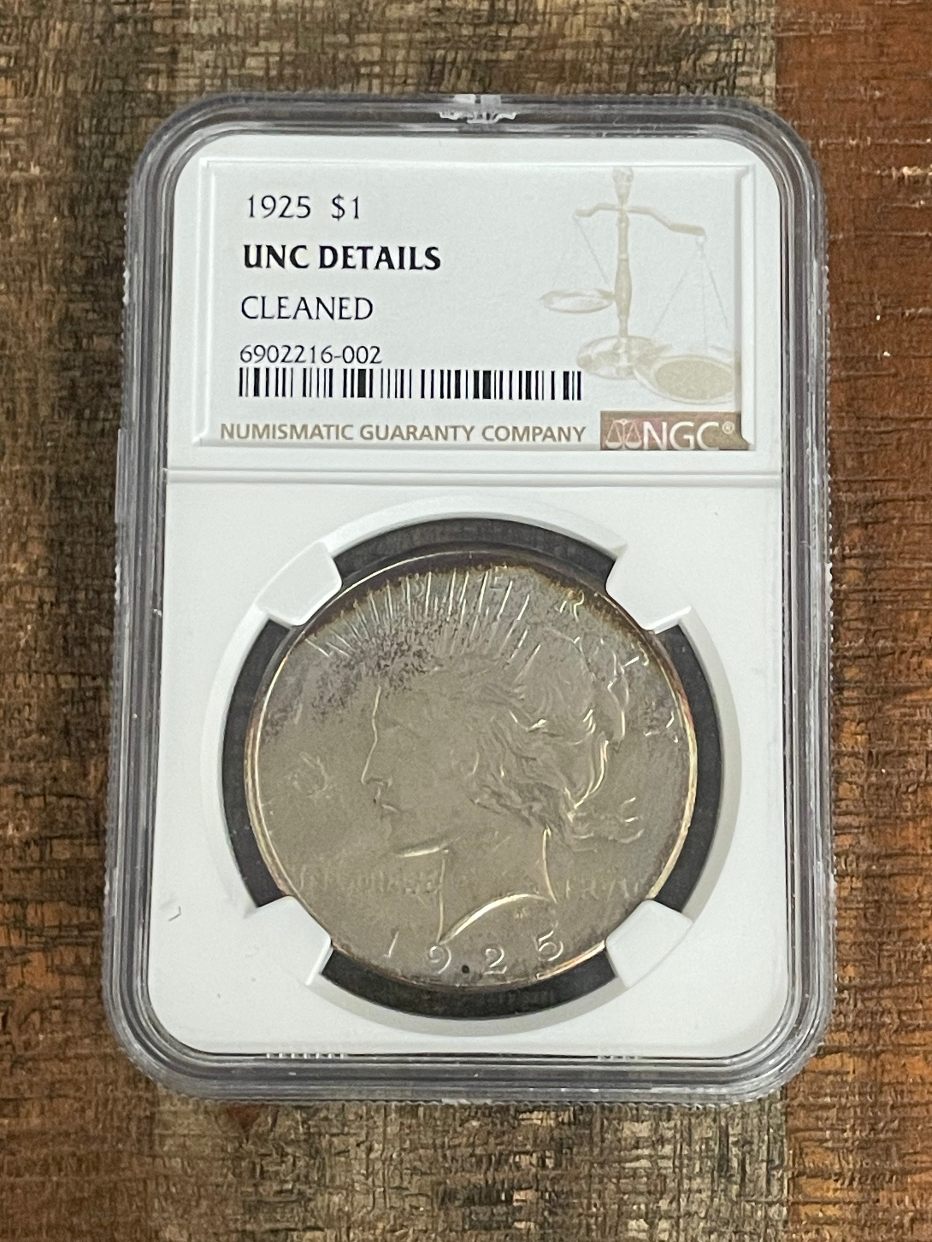 1925 $1 US Silver Peace Dollar NGC UNC Details ~ Cleaned ~ Beautifully Toned