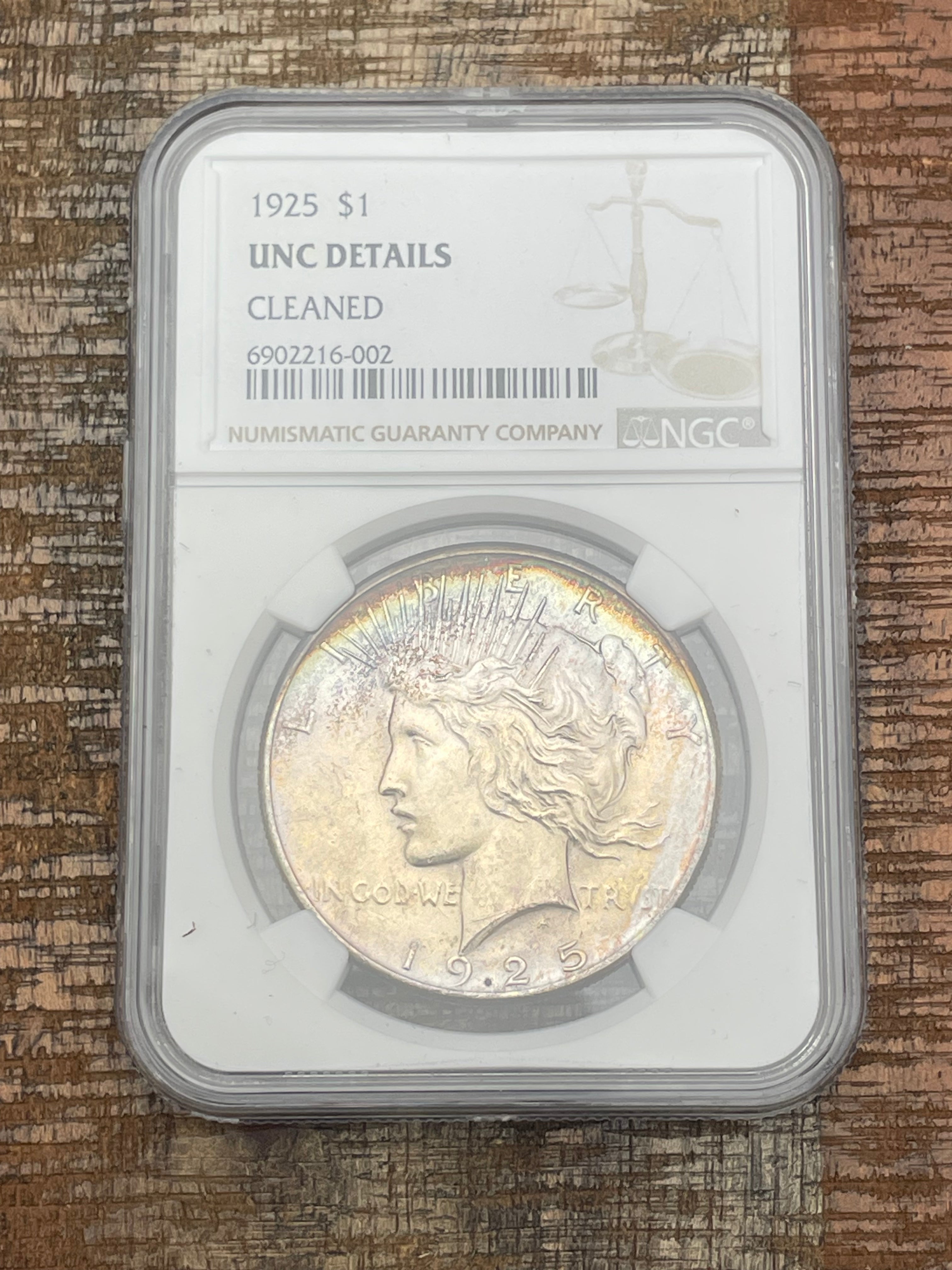 1925 $1 US Silver Peace Dollar NGC UNC Details ~ Cleaned ~ Beautifully Toned