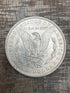 1883-O $1 US Morgan Silver Dollar
