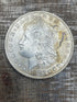 1883-O $1 US Morgan Silver Dollar