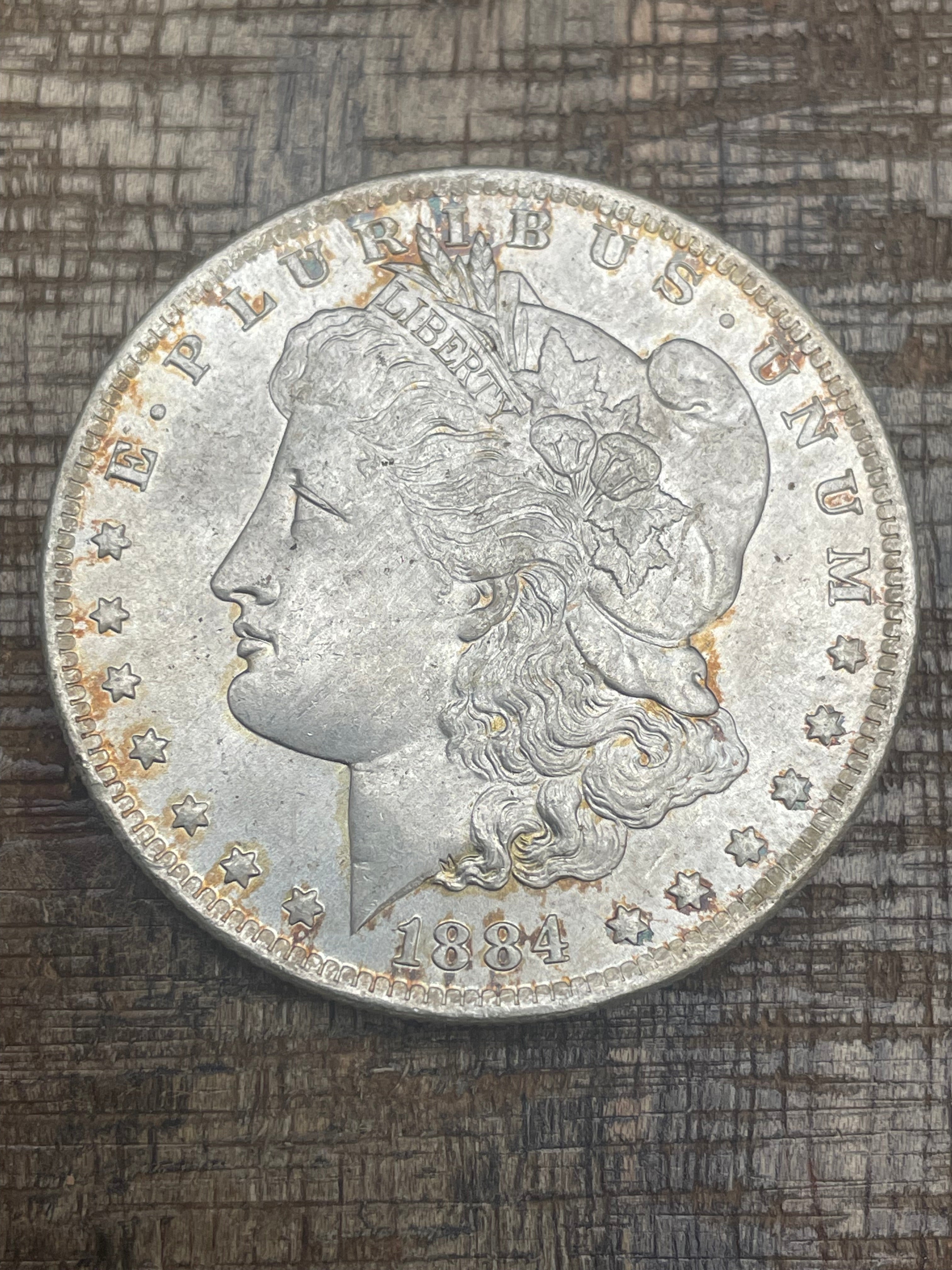 1884-O $1 US Morgan Silver Dollar