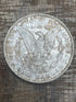 1884-O $1 US Morgan Silver Dollar