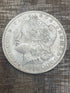 1884-O $1 US Morgan Silver Dollar