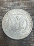 1884-O $1 US Morgan Silver Dollar