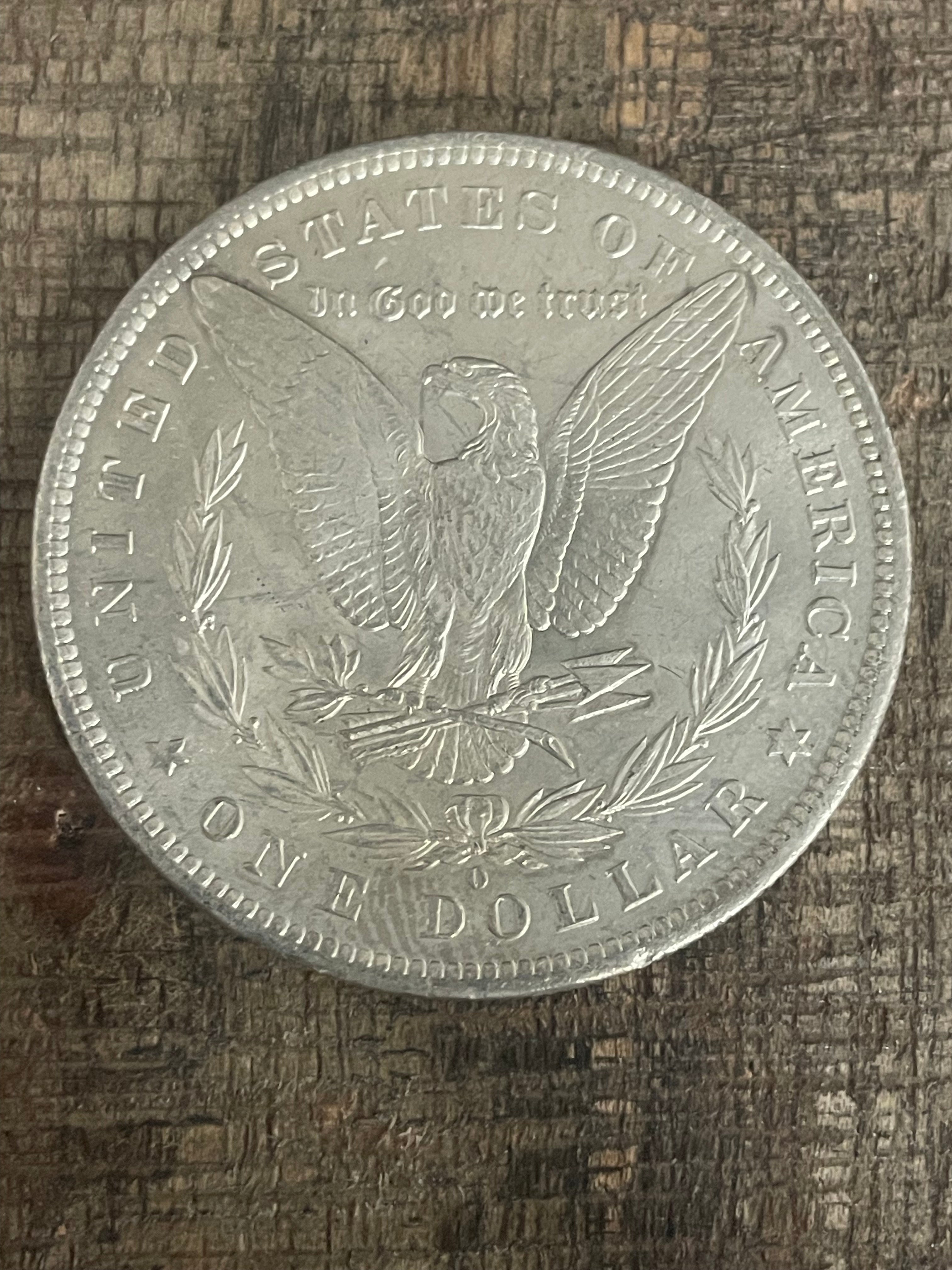 1884-O $1 US Morgan Silver Dollar