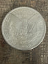 1884-O $1 US Morgan Silver Dollar