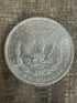 1884-O $1 US Morgan Silver Dollar