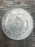 1884-O $1 US Morgan Silver Dollar