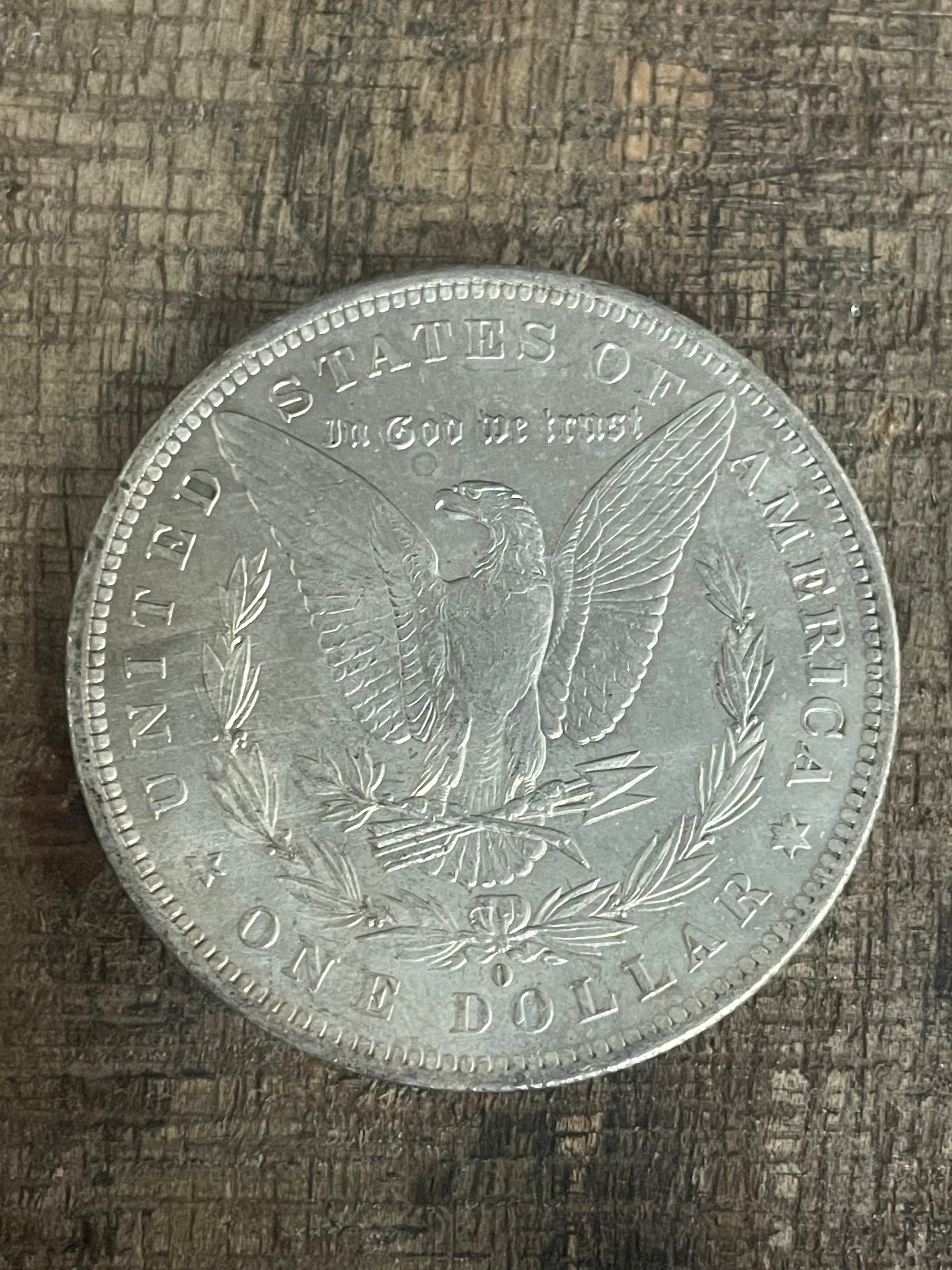 1884-O $1 US Morgan Silver Dollar