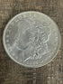 1884-O $1 US Morgan Silver Dollar