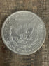 1884-O $1 US Morgan Silver Dollar