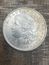 1884-O $1 US Morgan Silver Dollar