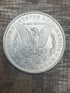 1884-O $1 US Morgan Silver Dollar