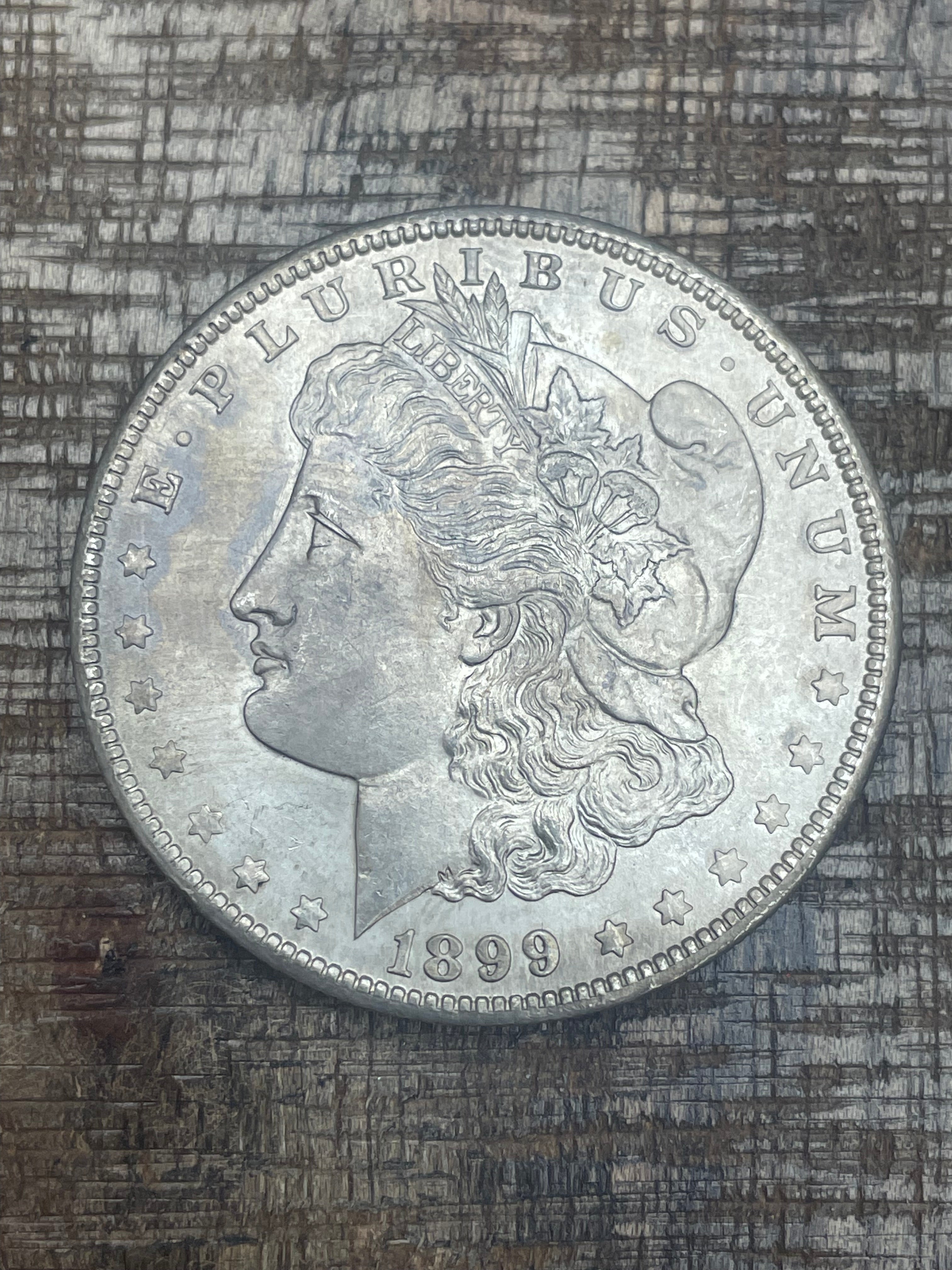 1899-O $1 US Morgan Silver Dollar