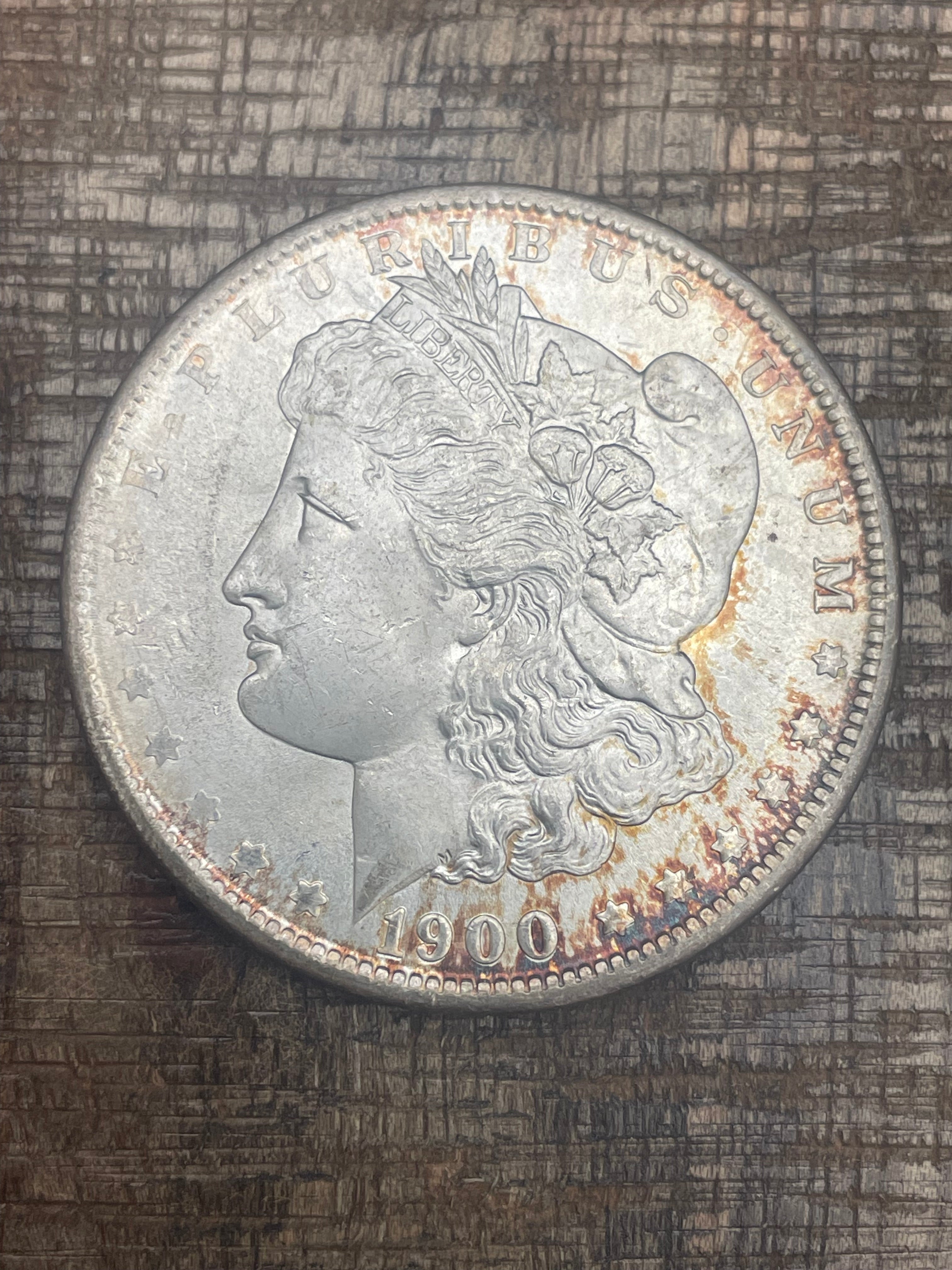 1900-O $1 US Morgan Silver Dollar