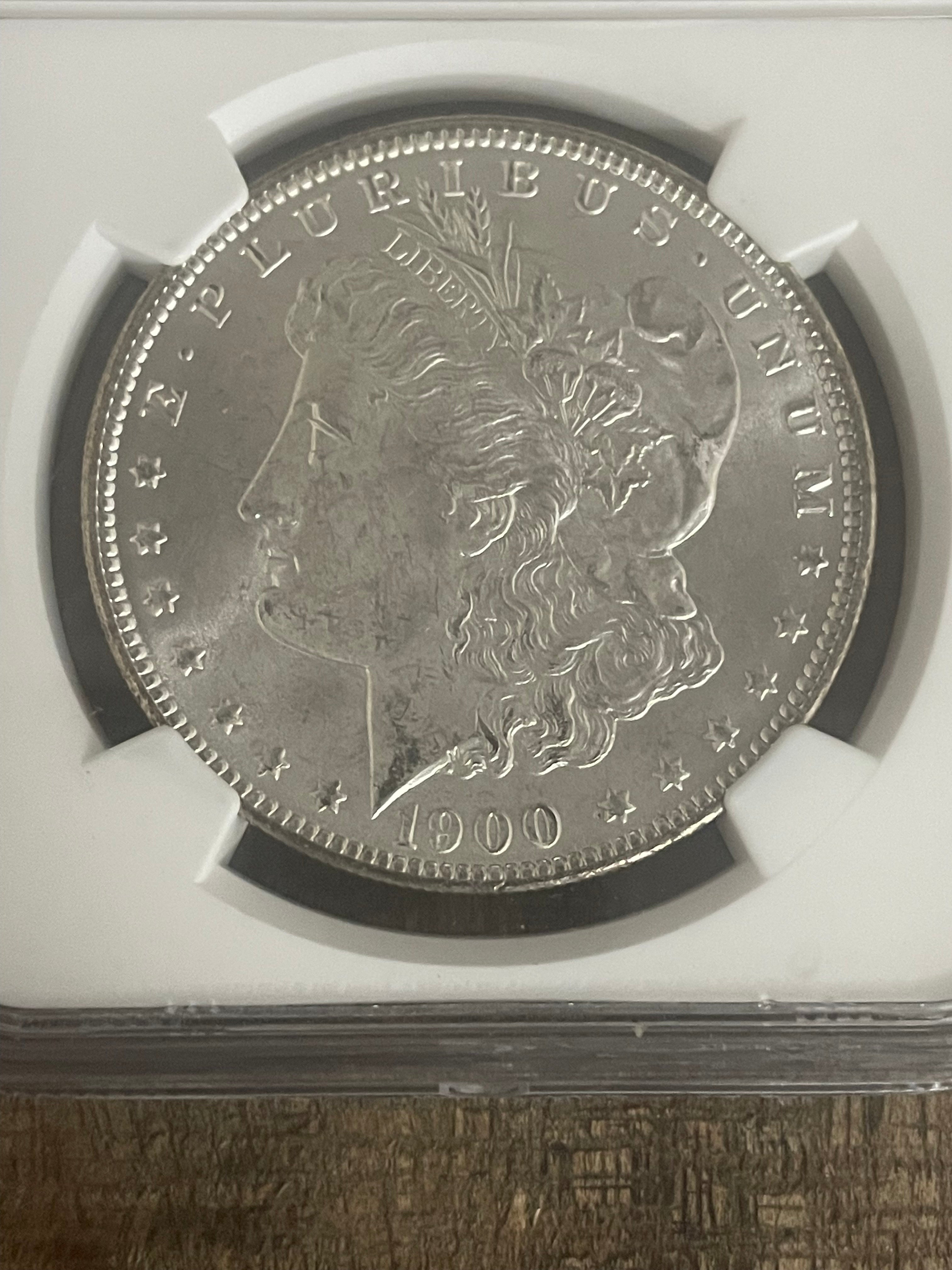 1900 $1 US Morgan Silver Dollar NGC MS65