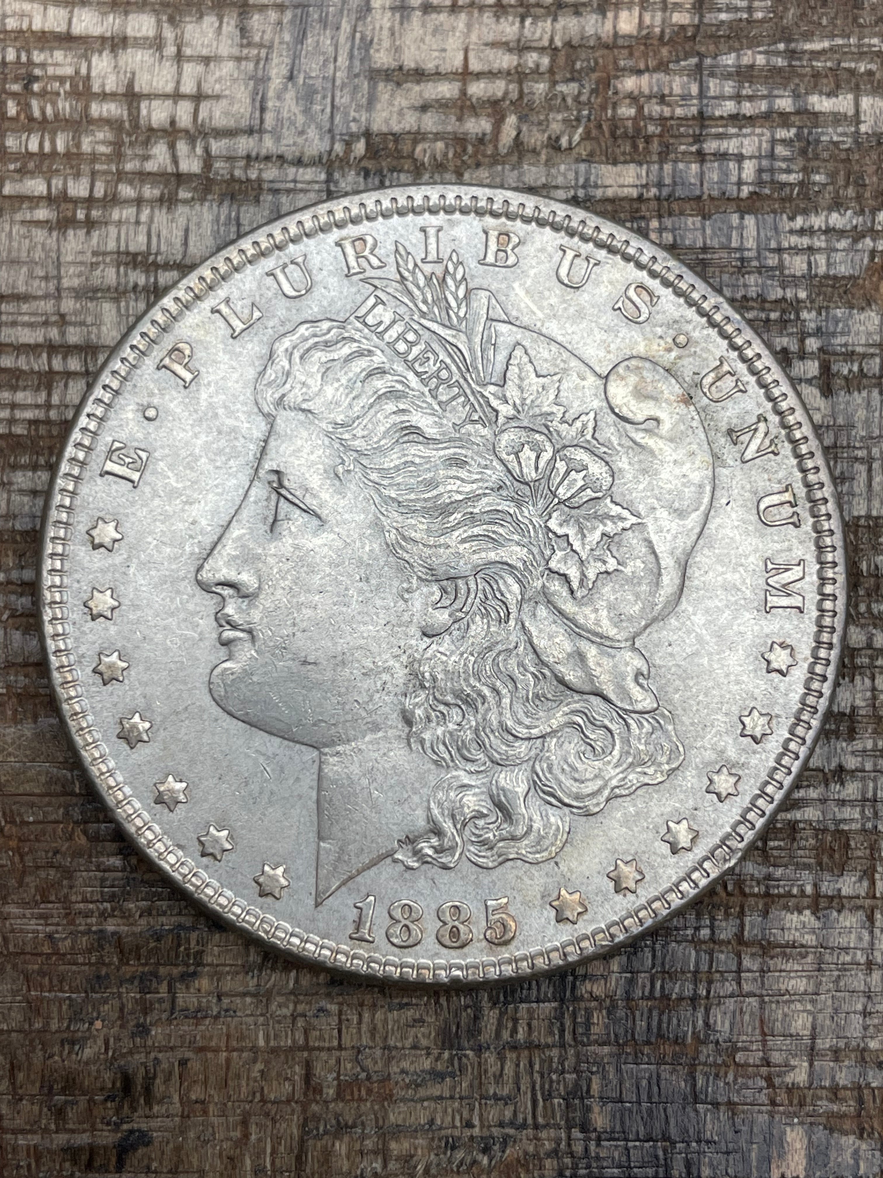 1885 $1 US Morgan Silver Dollar