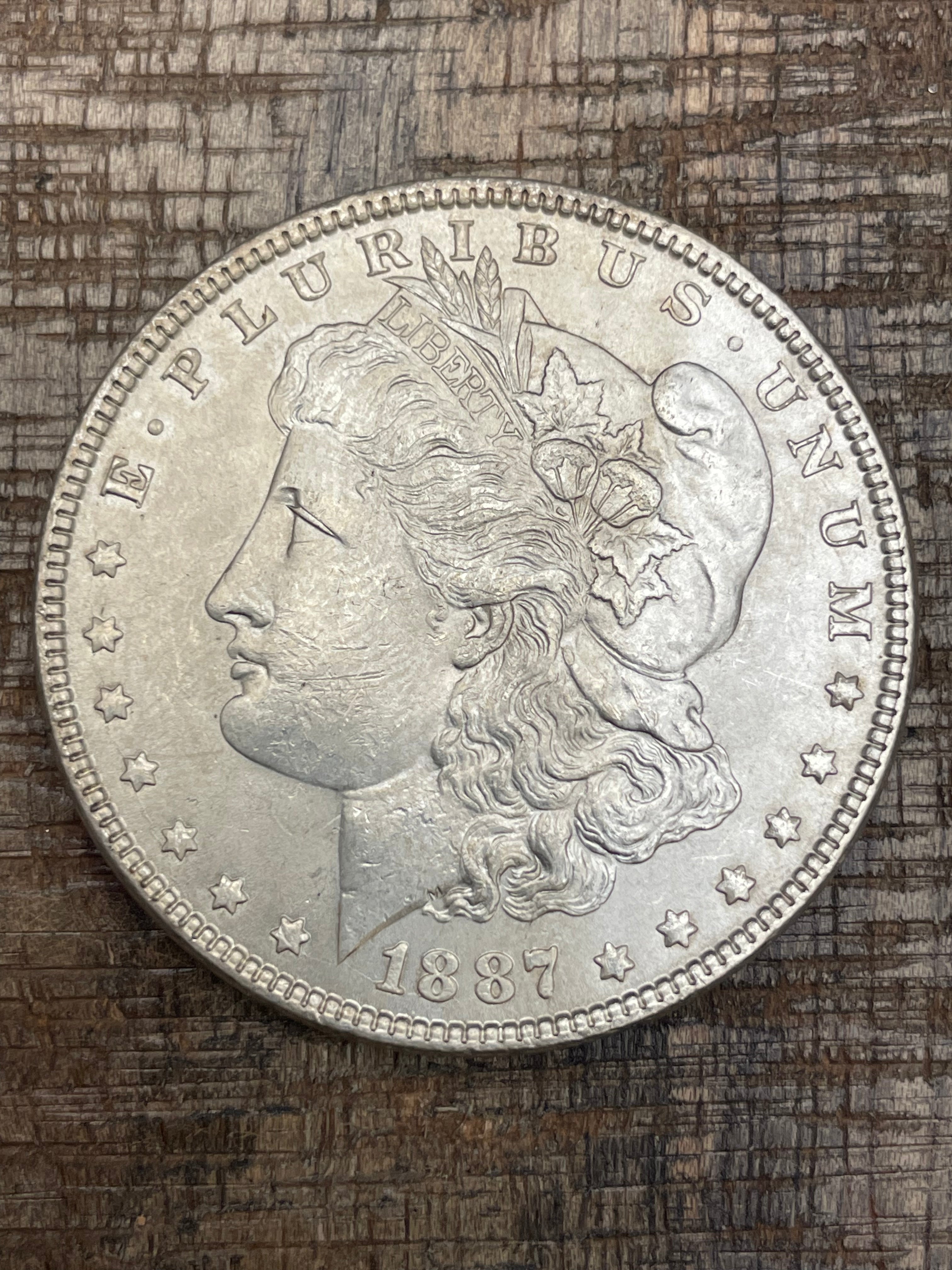 1887 $1 US Morgan Silver Dollar