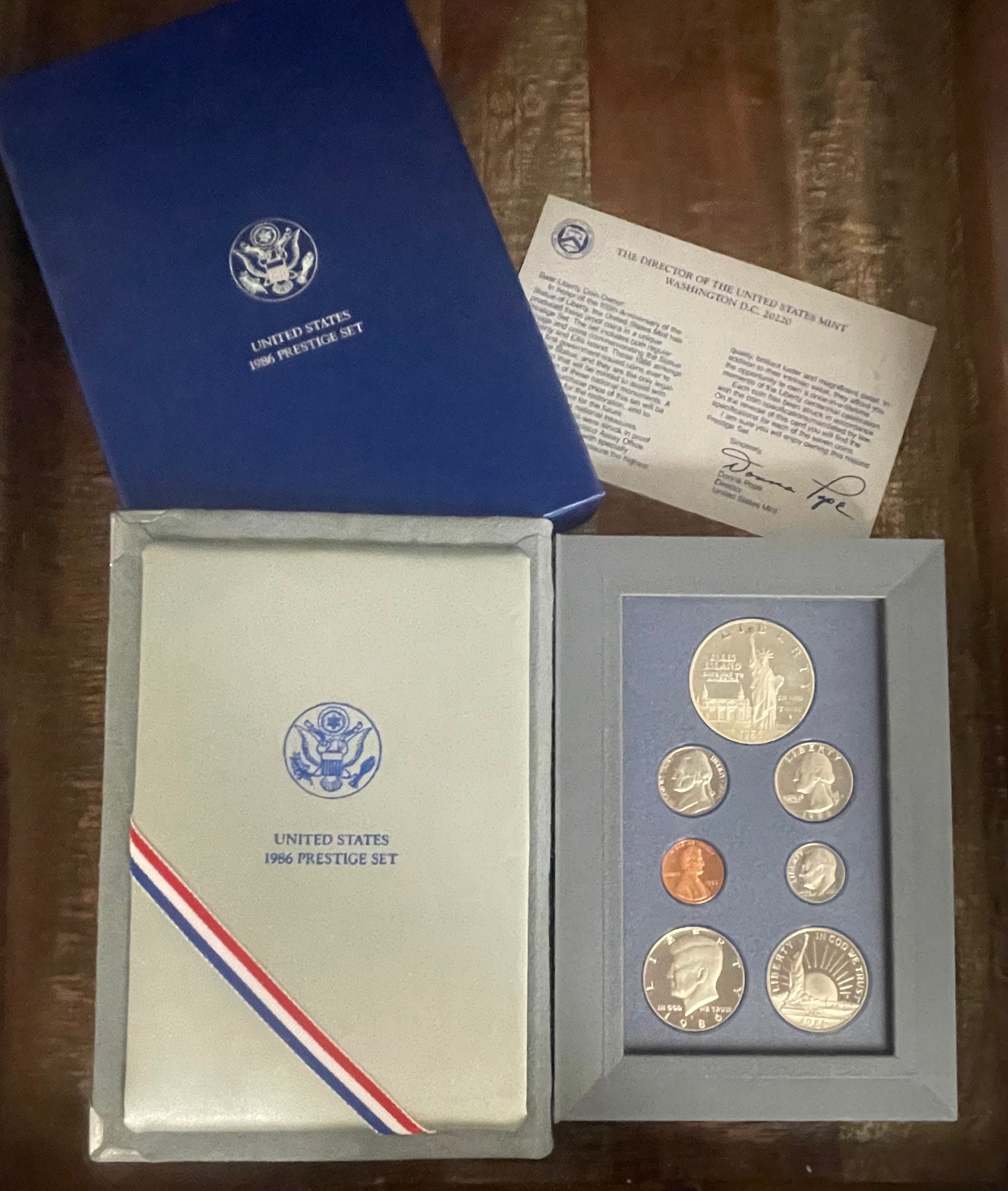 1986-S US Prestige Set Liberty Silver Dollar 7 Coins in OGP w/ COA