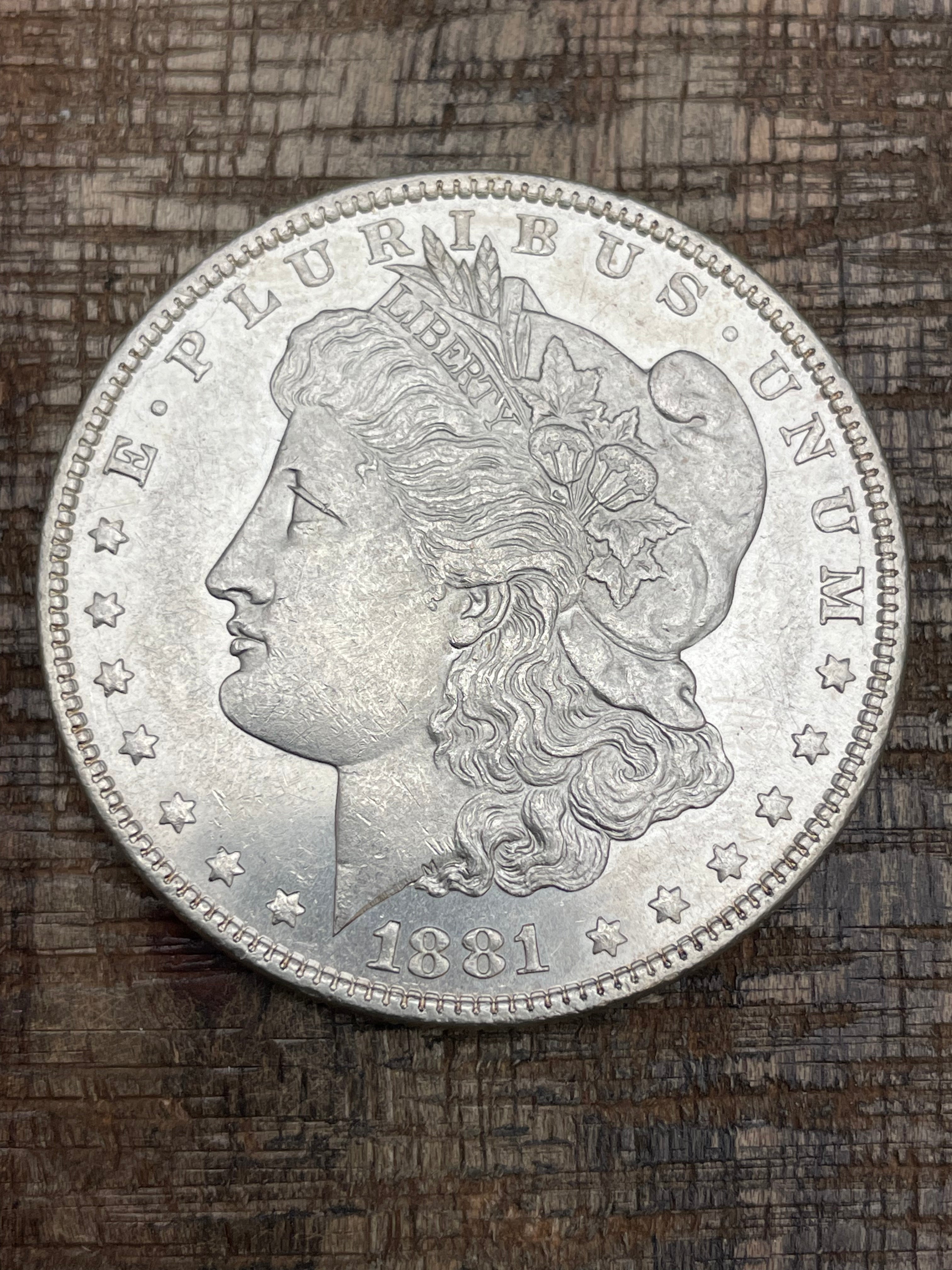 1881-O $1 US Morgan Silver Dollar