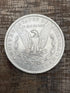 1884-O $1 US Morgan Silver Dollar