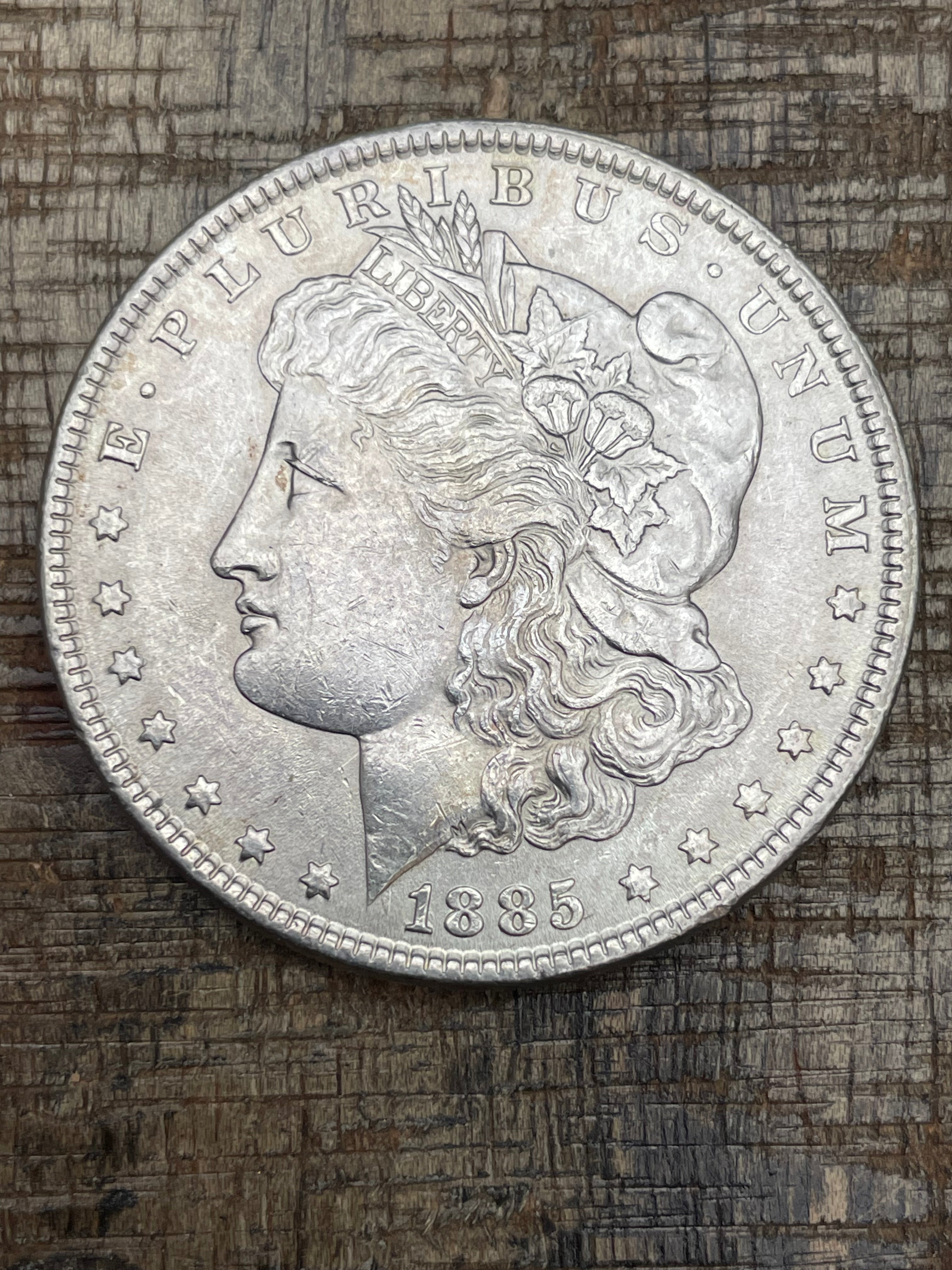 1885 $1 US Morgan Silver Dollar