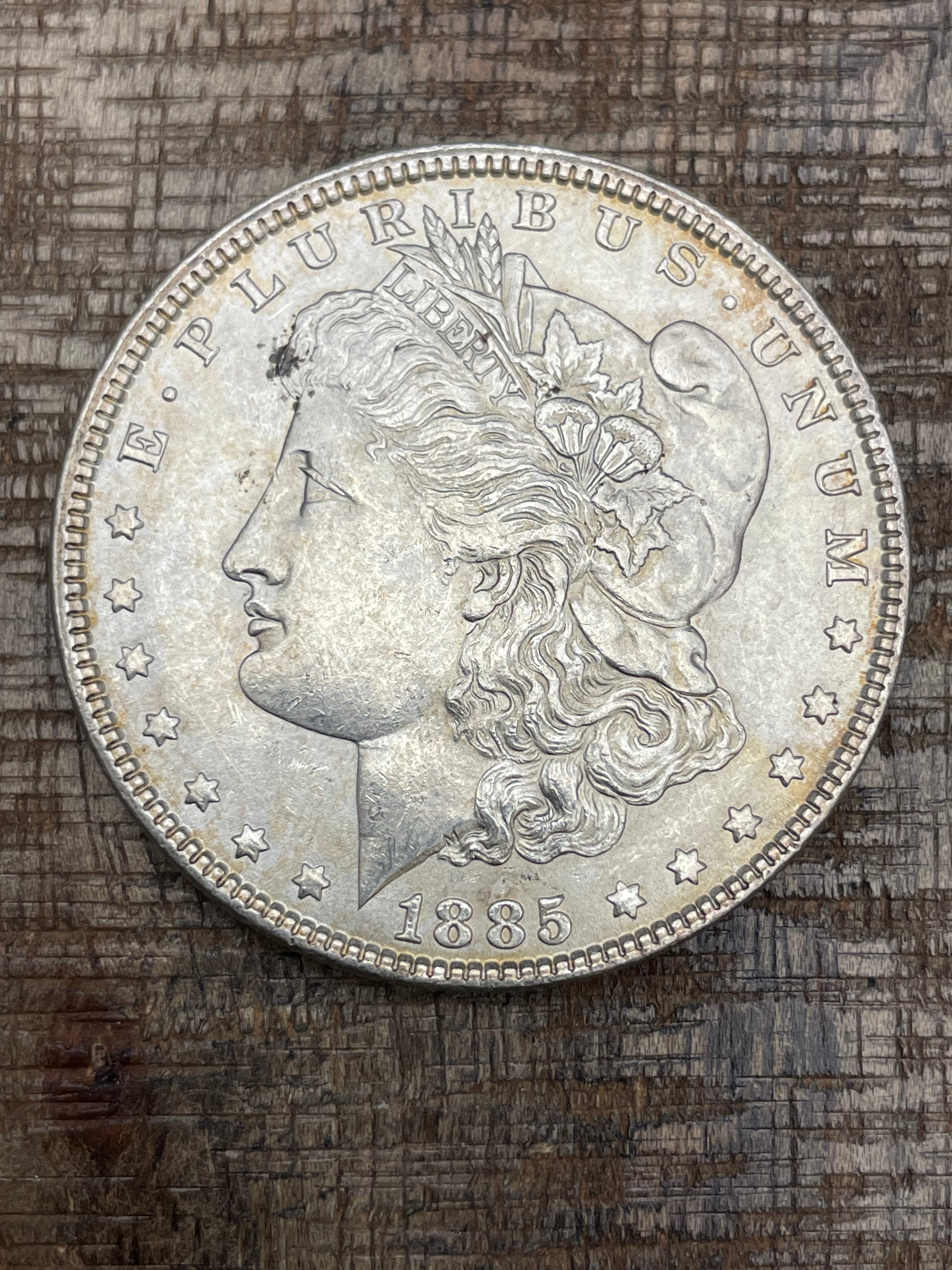 1885 $1 US Morgan Silver Dollar