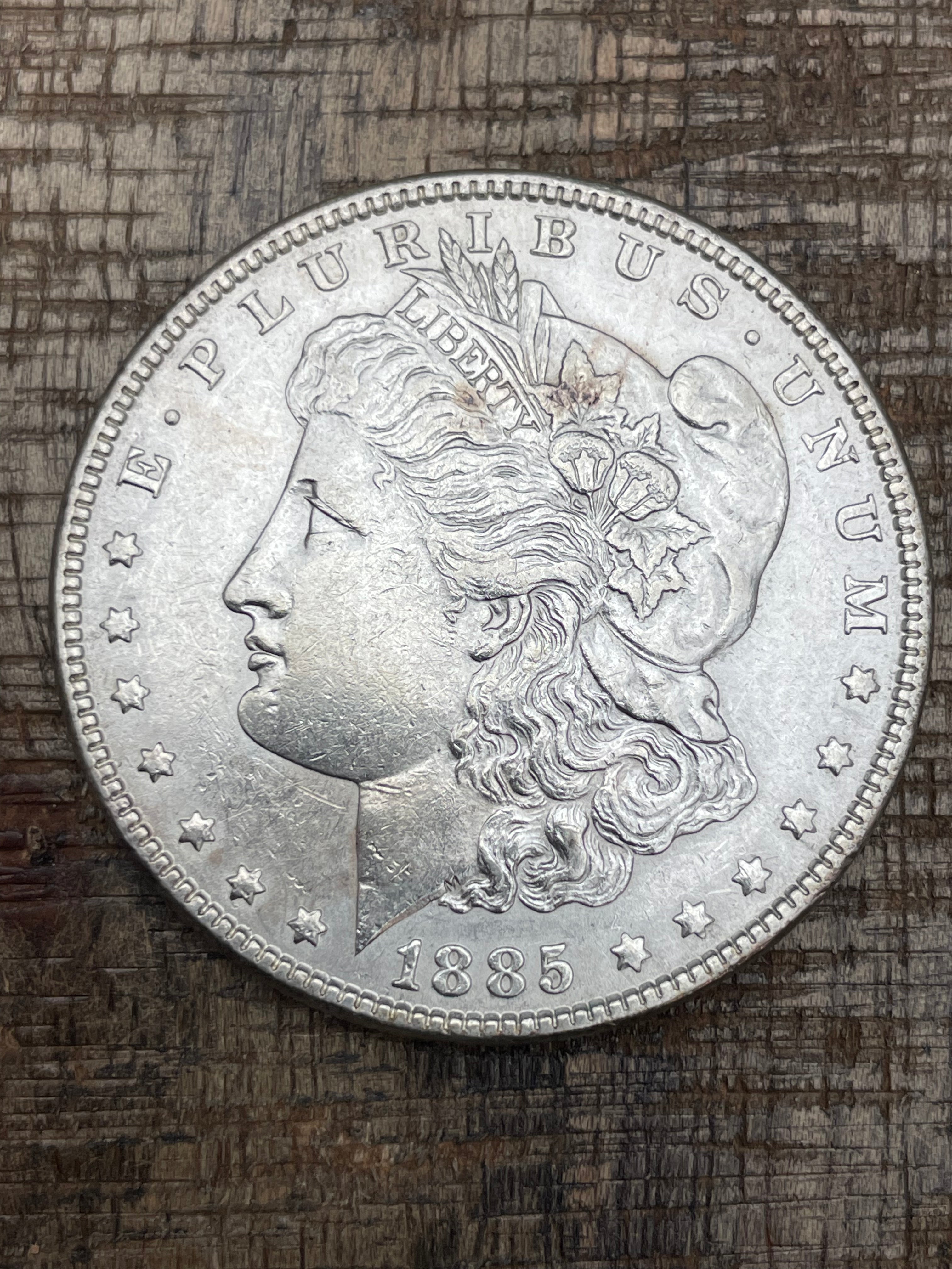 1885 $1 US Morgan Silver Dollar